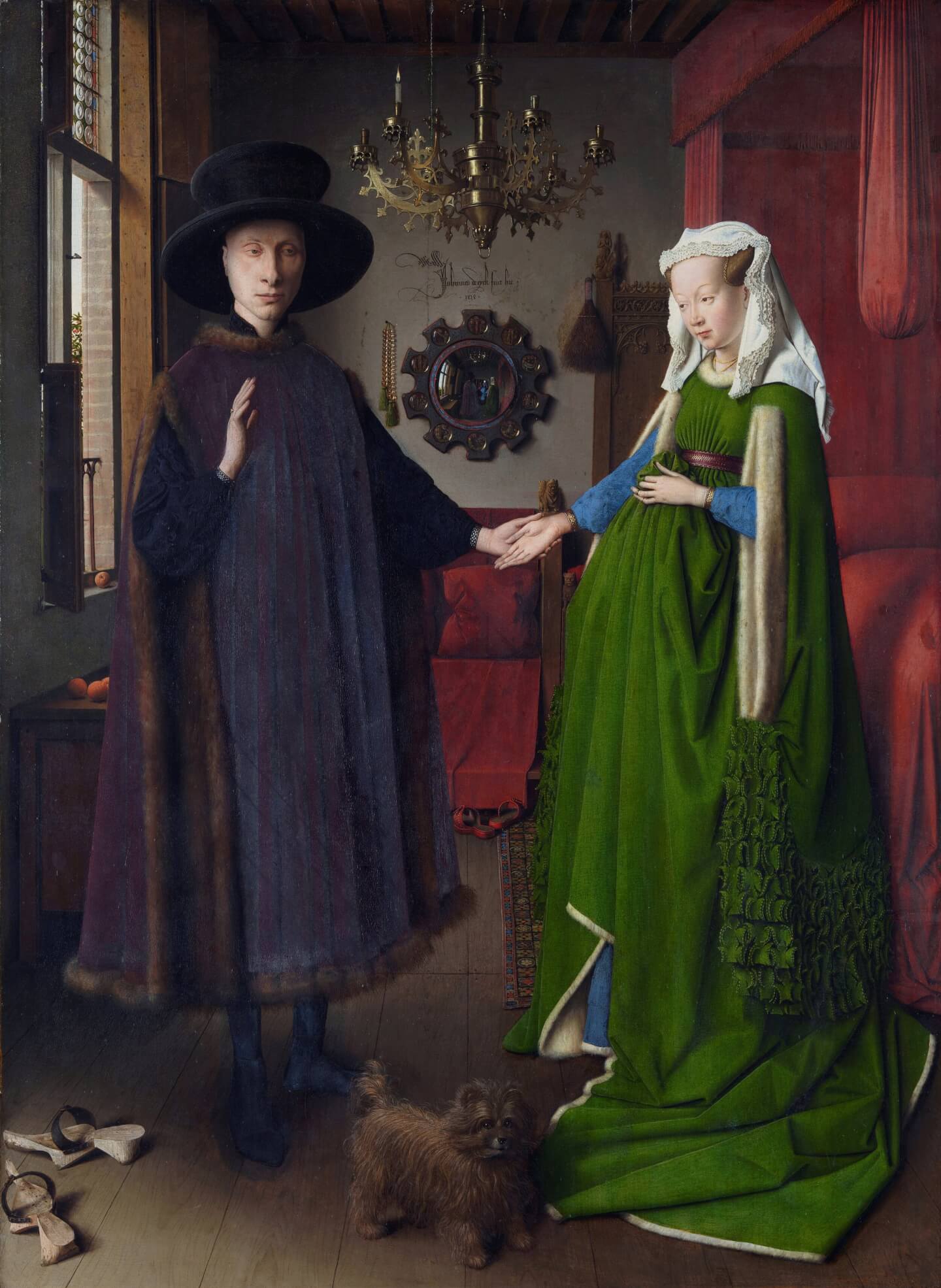 The Arnolfini Portait by Jan van Eyck - a rich Italian cloth merchant  with one of his most prized possessions.