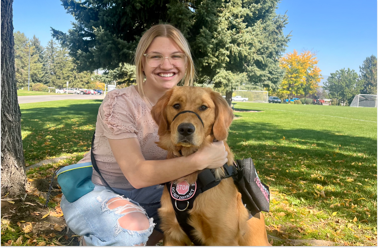 Sophia with her seizure alert dog, Murphy