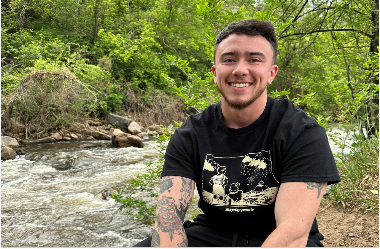 Hunter (@hknter) smiling while out in nature