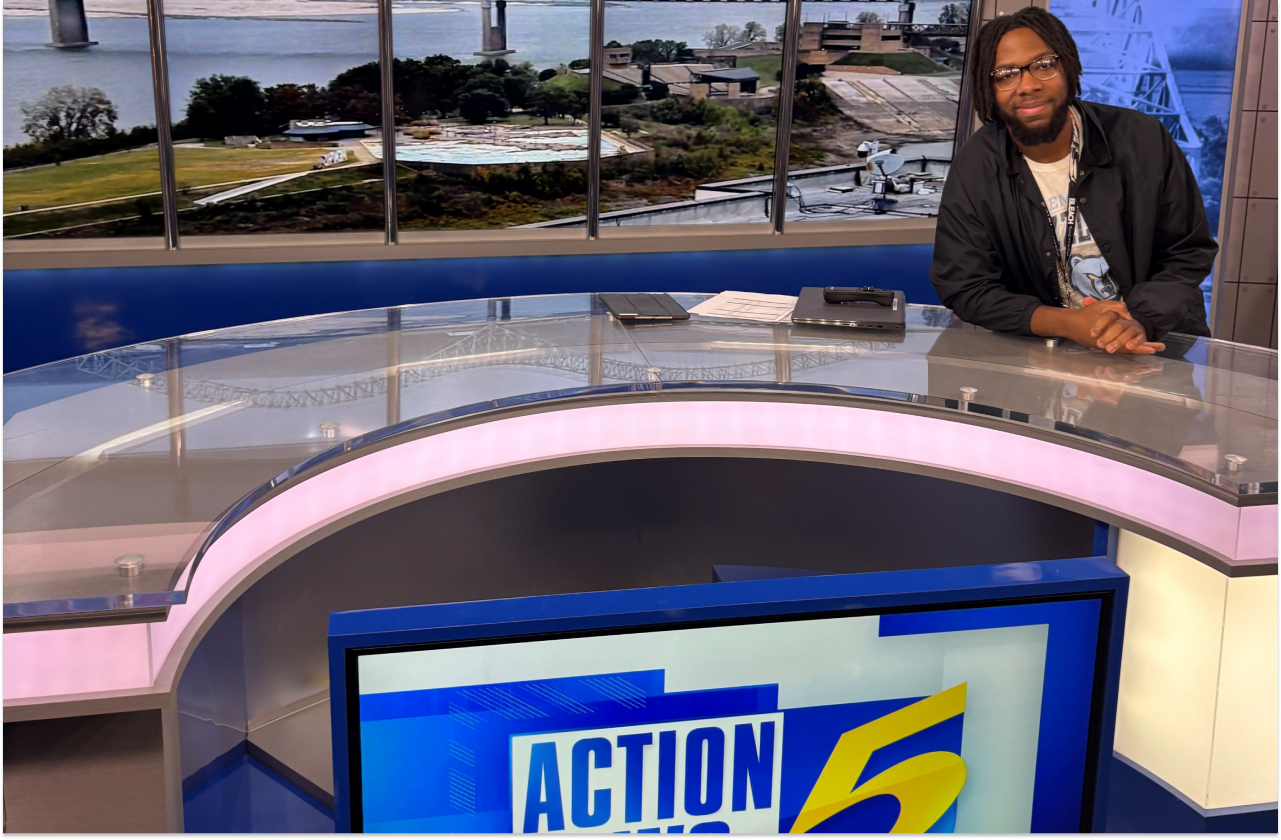 Melek sat at the Action News 5 desk