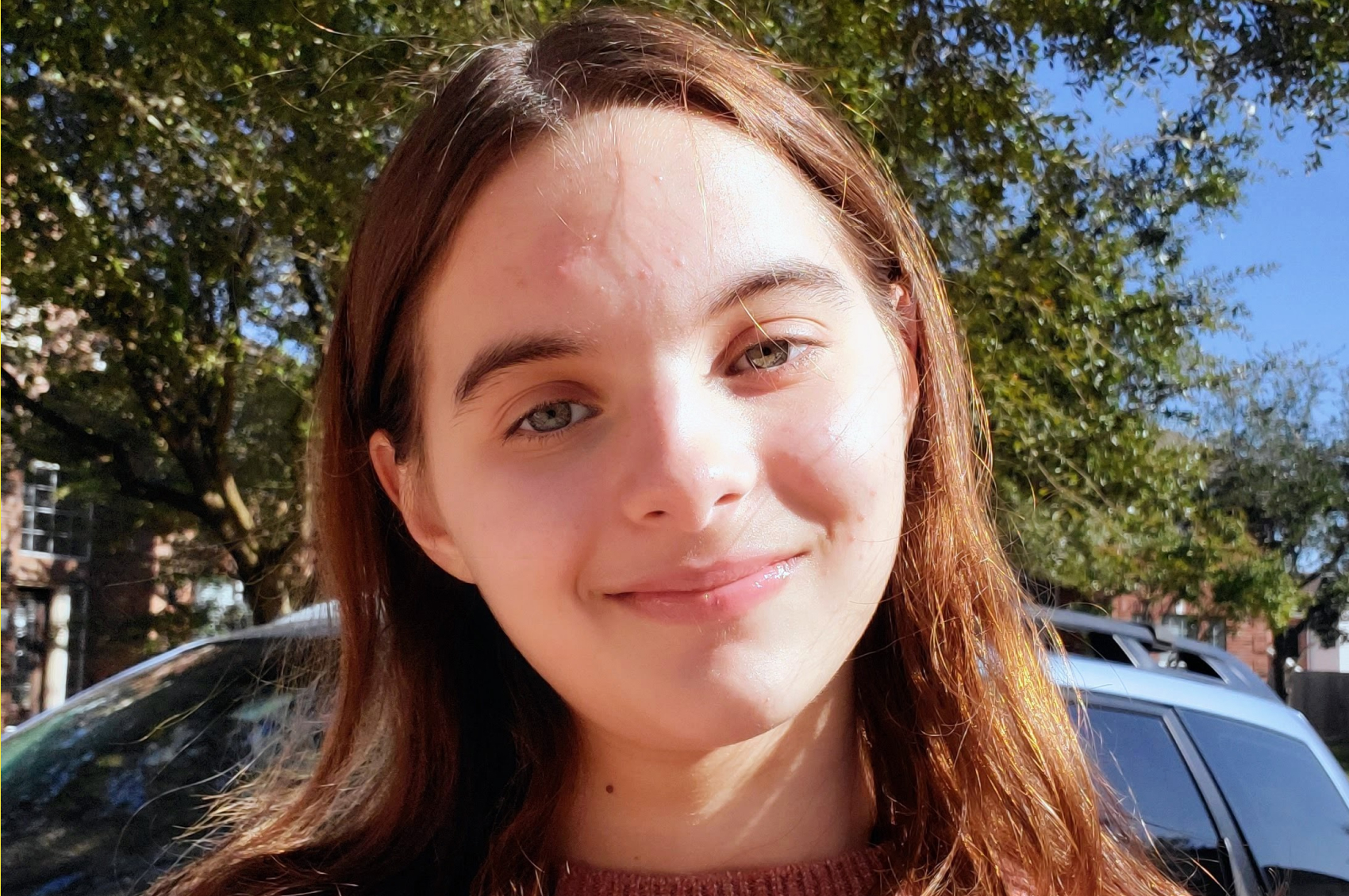 Emmi smiling while sharing her catamenial epilepsy story
