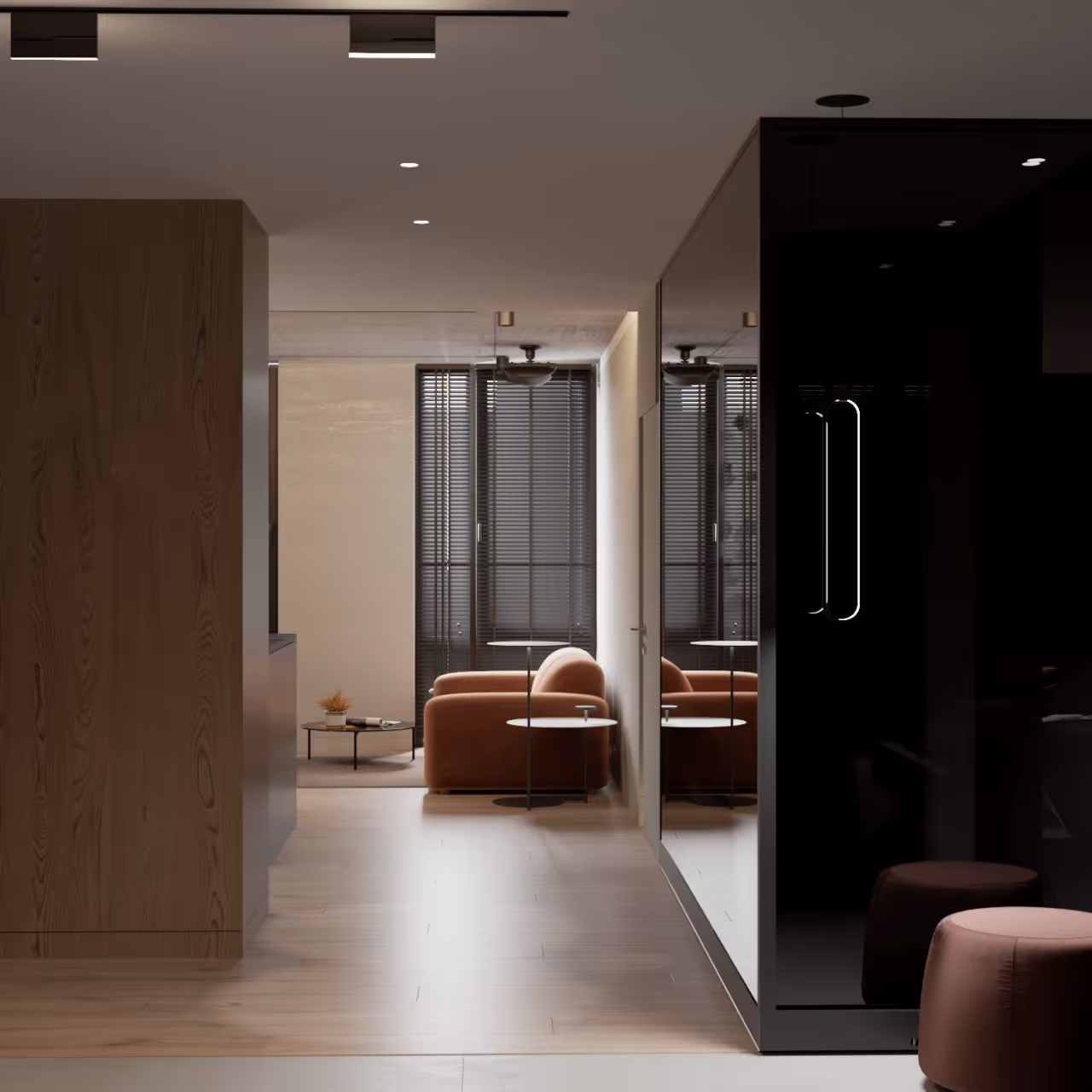 Stylish corridor featuring dark wood paneling, contemporary lighting, and framed artwork.