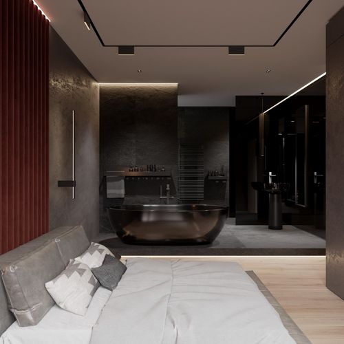 Minimalist bedroom in an apartment featuring a platform bed and soft ambient lighting.