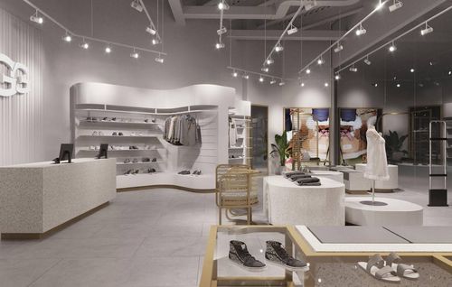 Stylish UGG store featuring their signature winter footwear, neatly arranged on sleek display tables with a cozy, inviting vibe.