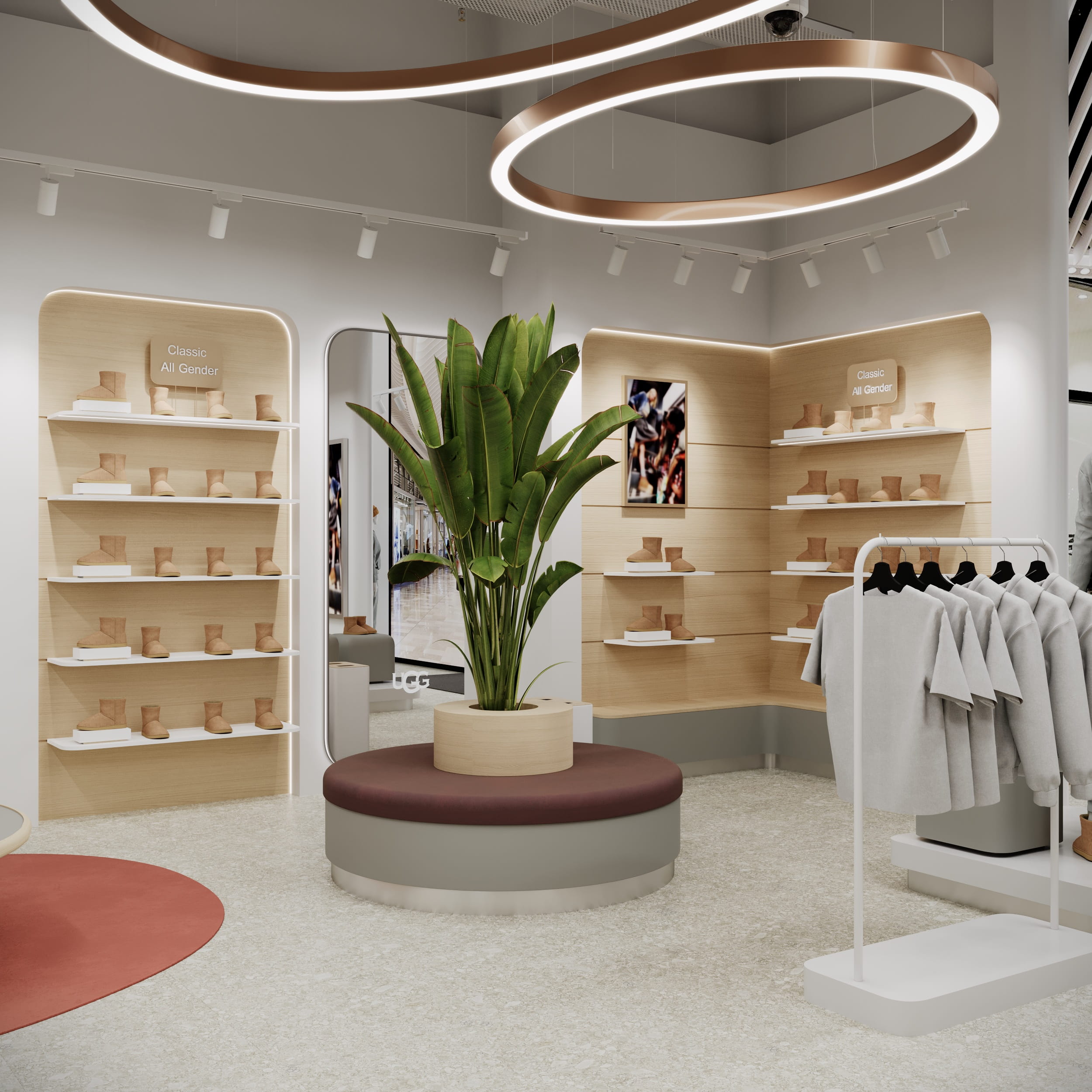 Центральна композиція магазину UGG з рослинами, зоною відпочинку та акцентними килимами.