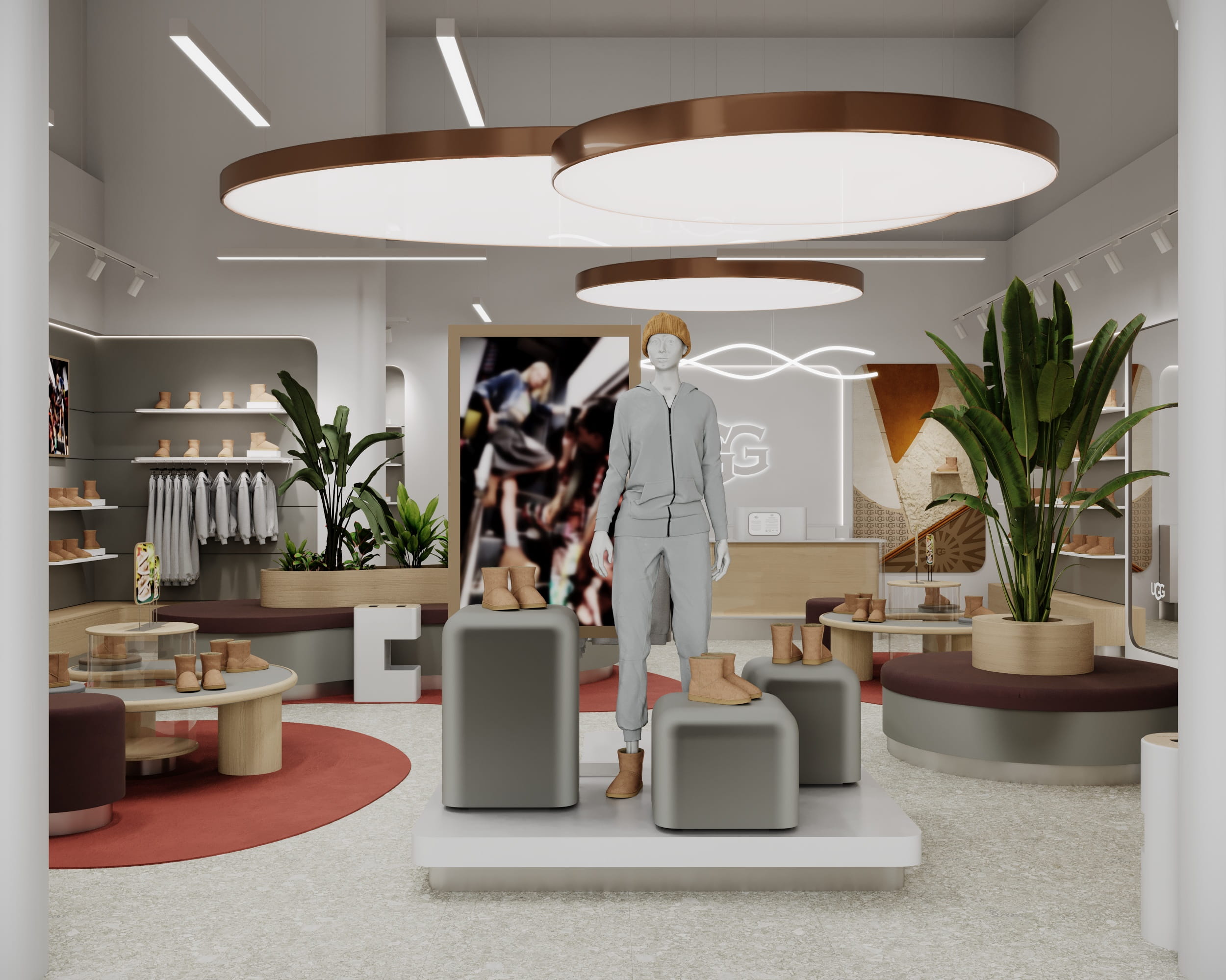 Торговий зал UGG з манекенами, вітринами та акцентними елементами інтер’єру.