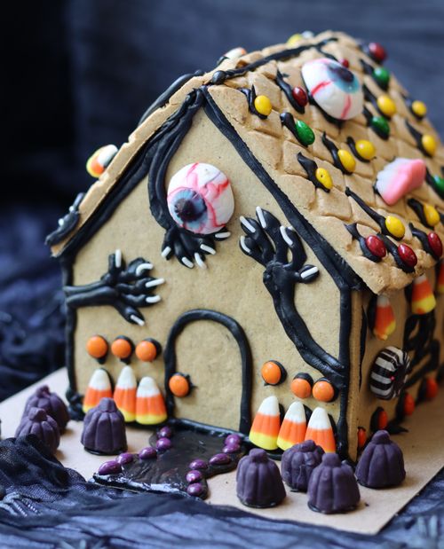 Halloween-themed gingerbread house candies, provided for virtual classes with kits or in-person workshops in the Bay Area, for holiday events.