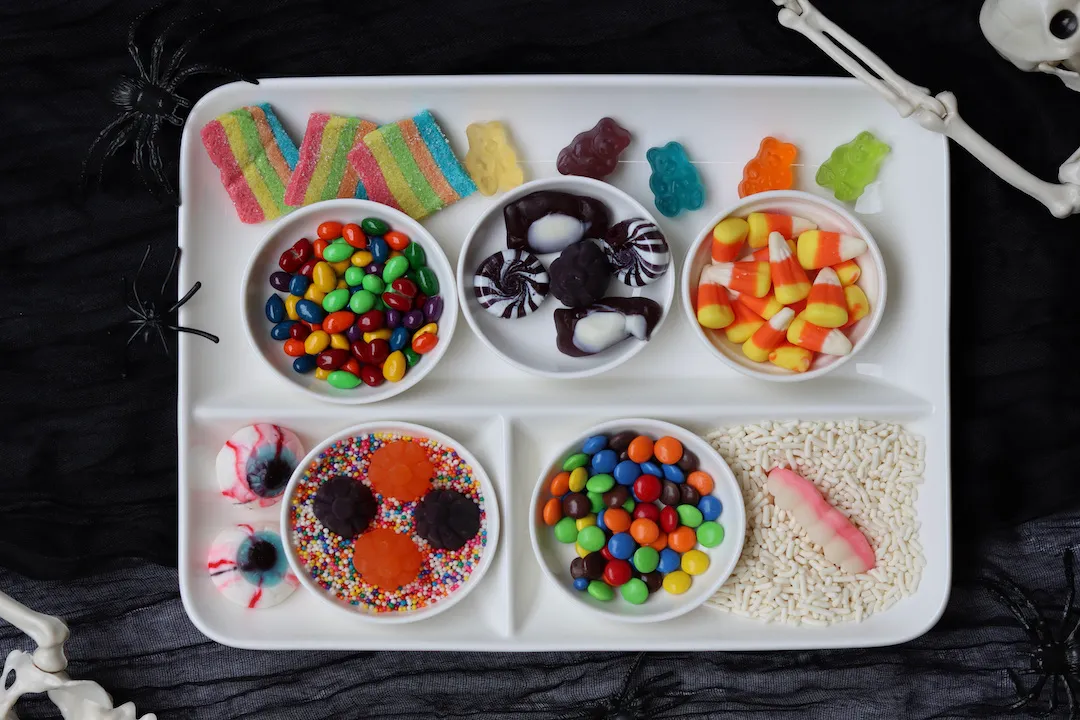 Join our Halloween-themed gingerbread house decorating workshop for a fun, creative corporate team-building experience. Perfect for seasonal team events. Book now!