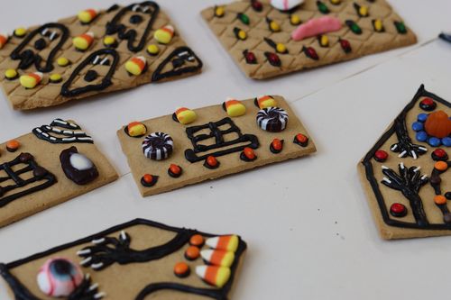 Join our Halloween-themed gingerbread house decorating workshop for a fun, creative corporate team-building experience. Perfect for seasonal team events. Book now!
