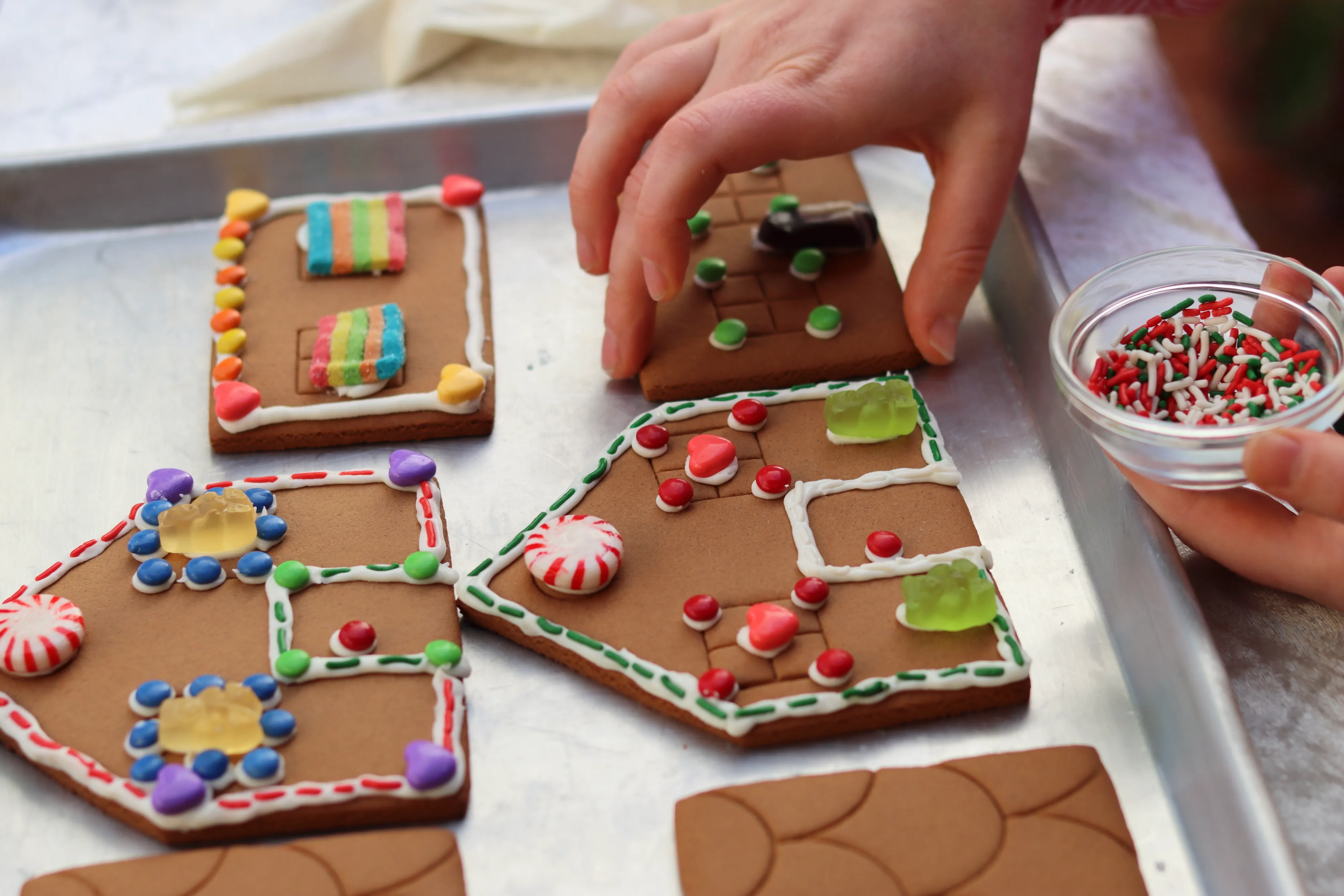 Virtual, expert-led gingerbread house decorating for corporate teams. A fun, hands-on holiday team building event with kits shipped.