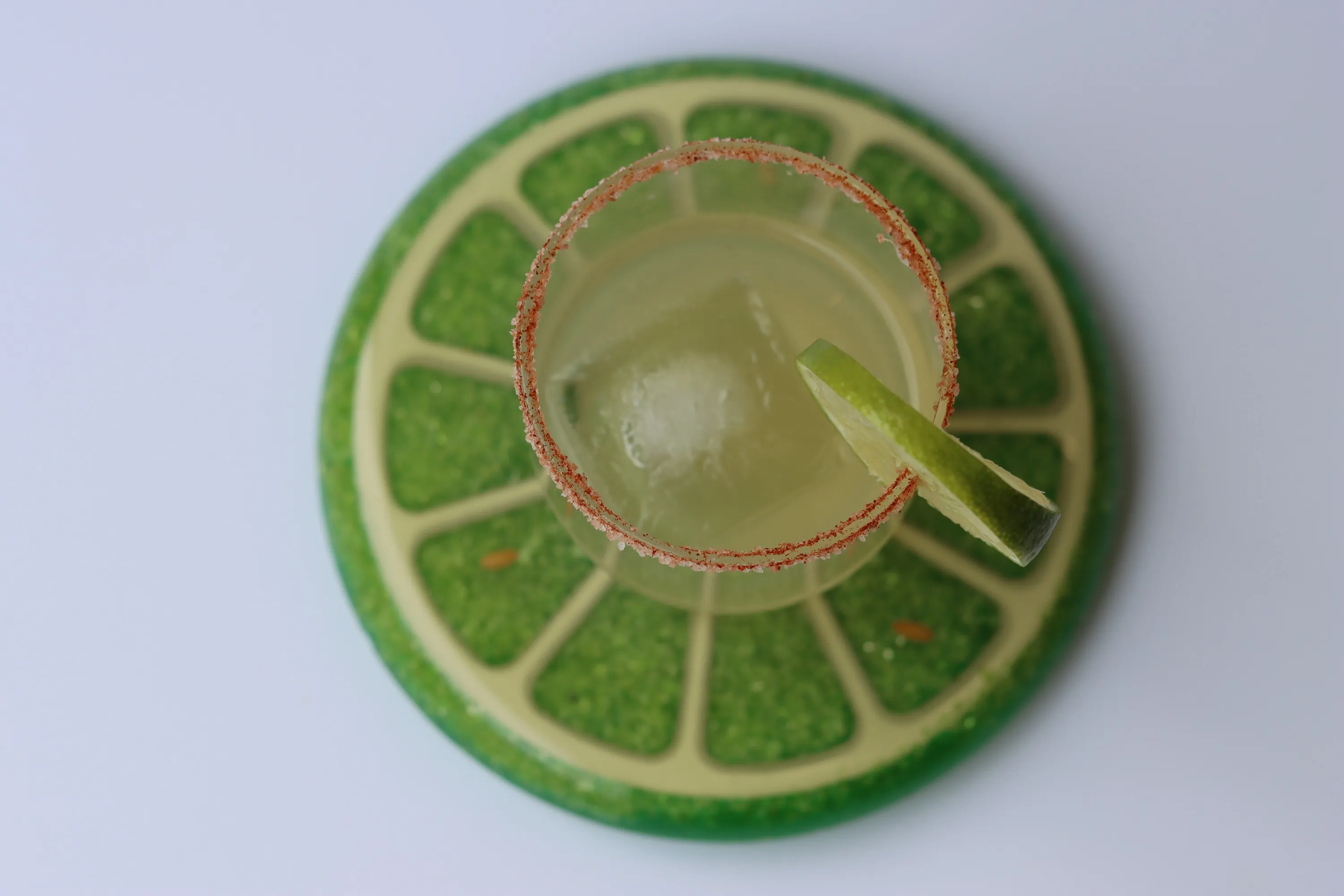 Mocktail on lime coaster made during mocktail mixology workshop