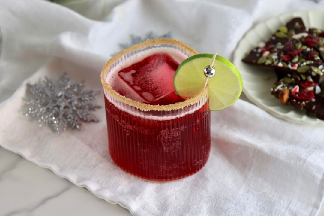 Celebrate the holidays with a festive Holiday Happy Hour workshop featuring mocktails, cocktails and desserts. Delicious Cranberry Cosmo & Chocolate Bark. Perfect for corporate team-building and hosting your own virtual holiday party.
