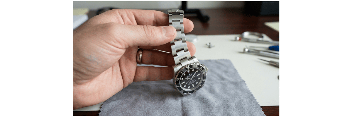 Image showing weight and material feel of Rolex watch