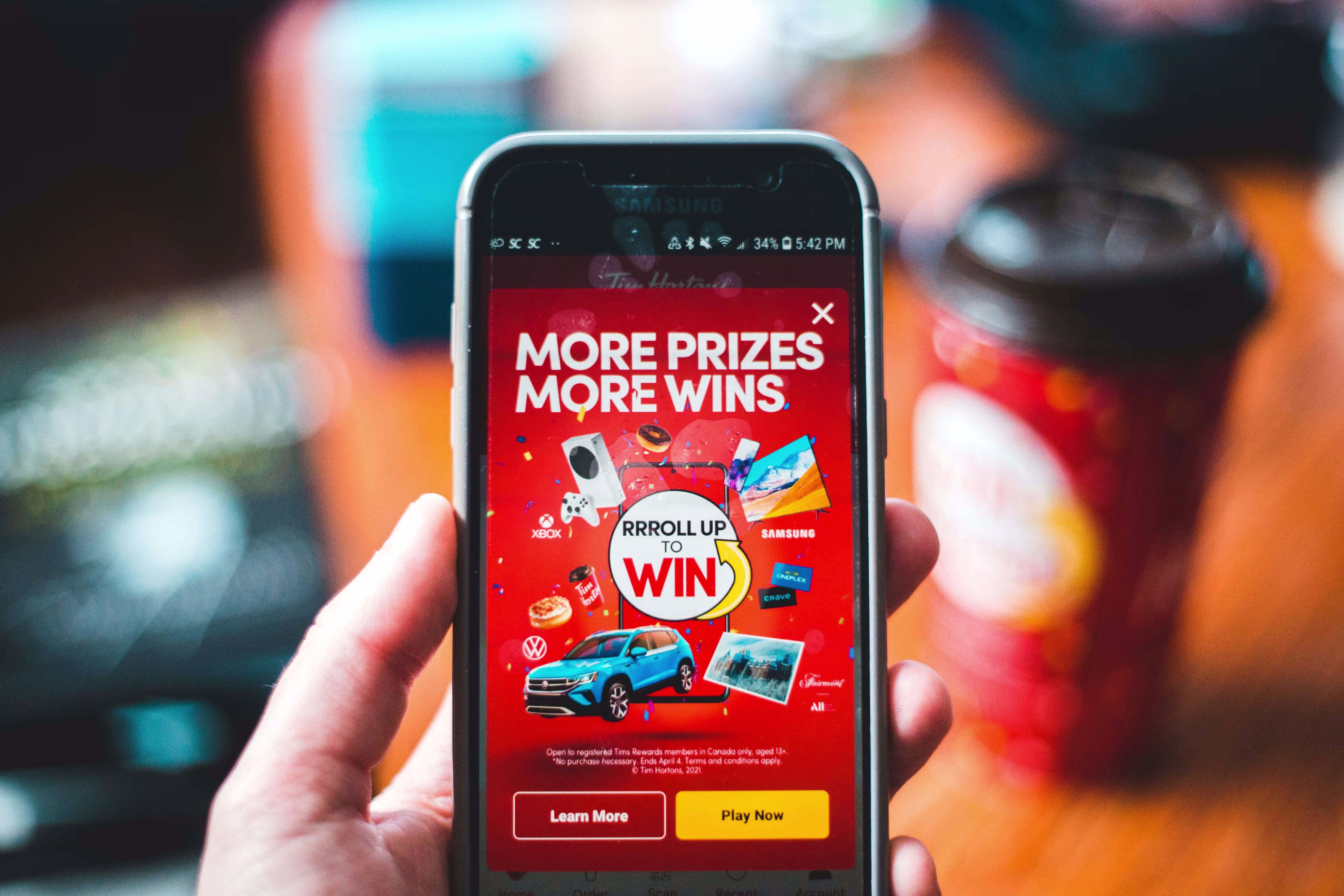 Lottery as an engagement mechanism in a loyalty app displayed on a smartphone