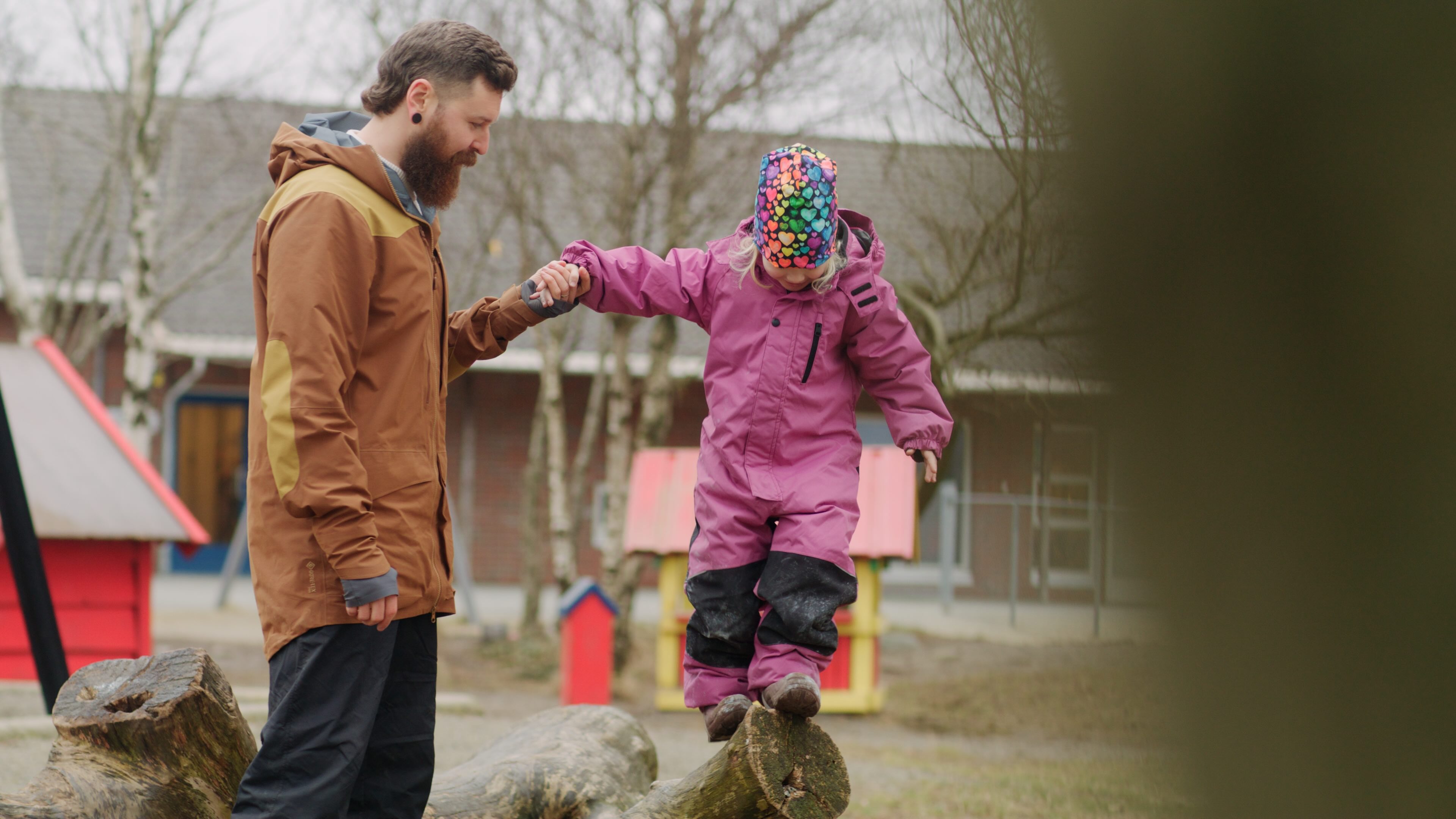 Teacher talking with child.