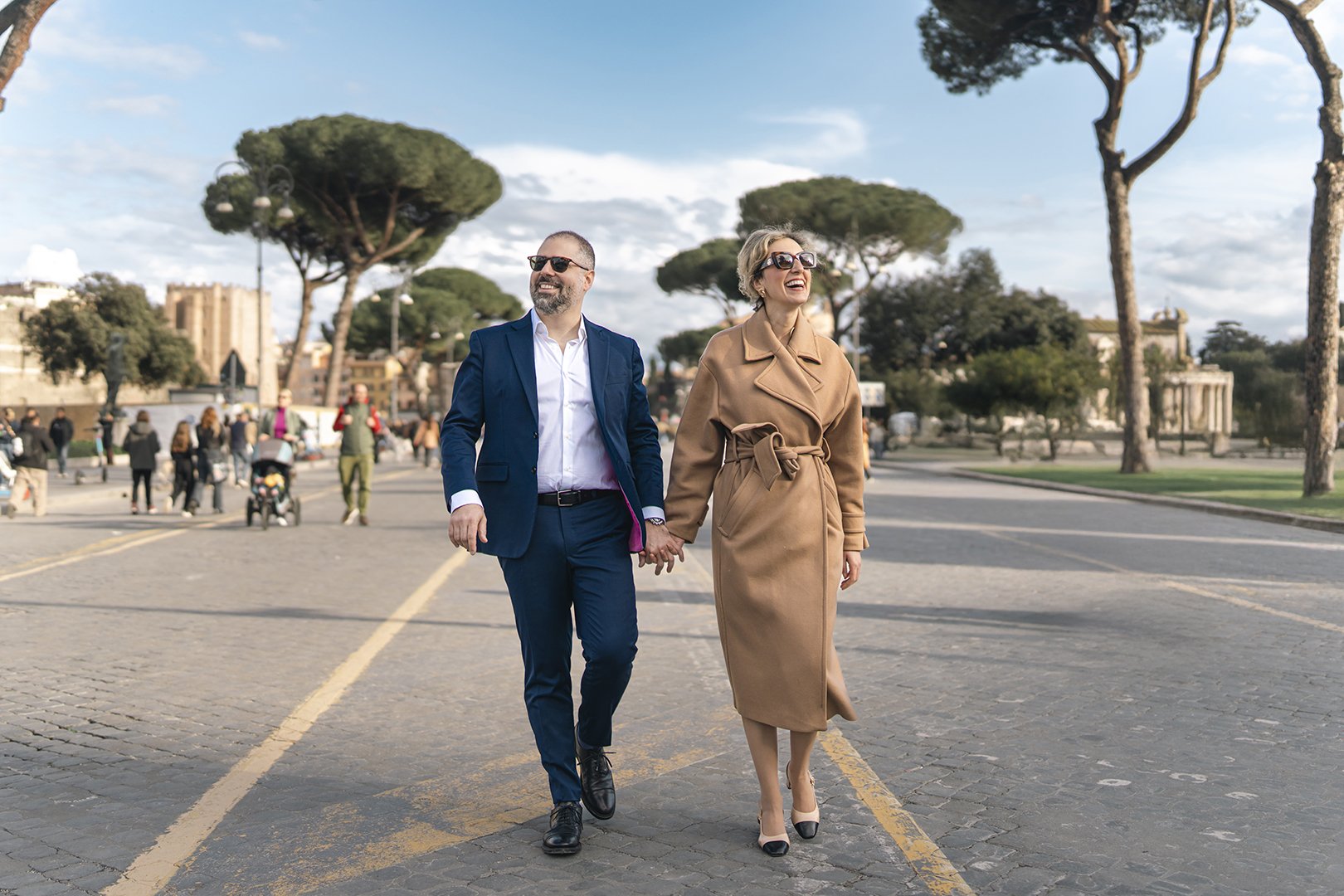 Couple photoshoot at via dei Fori Imperial, Rome, Italy