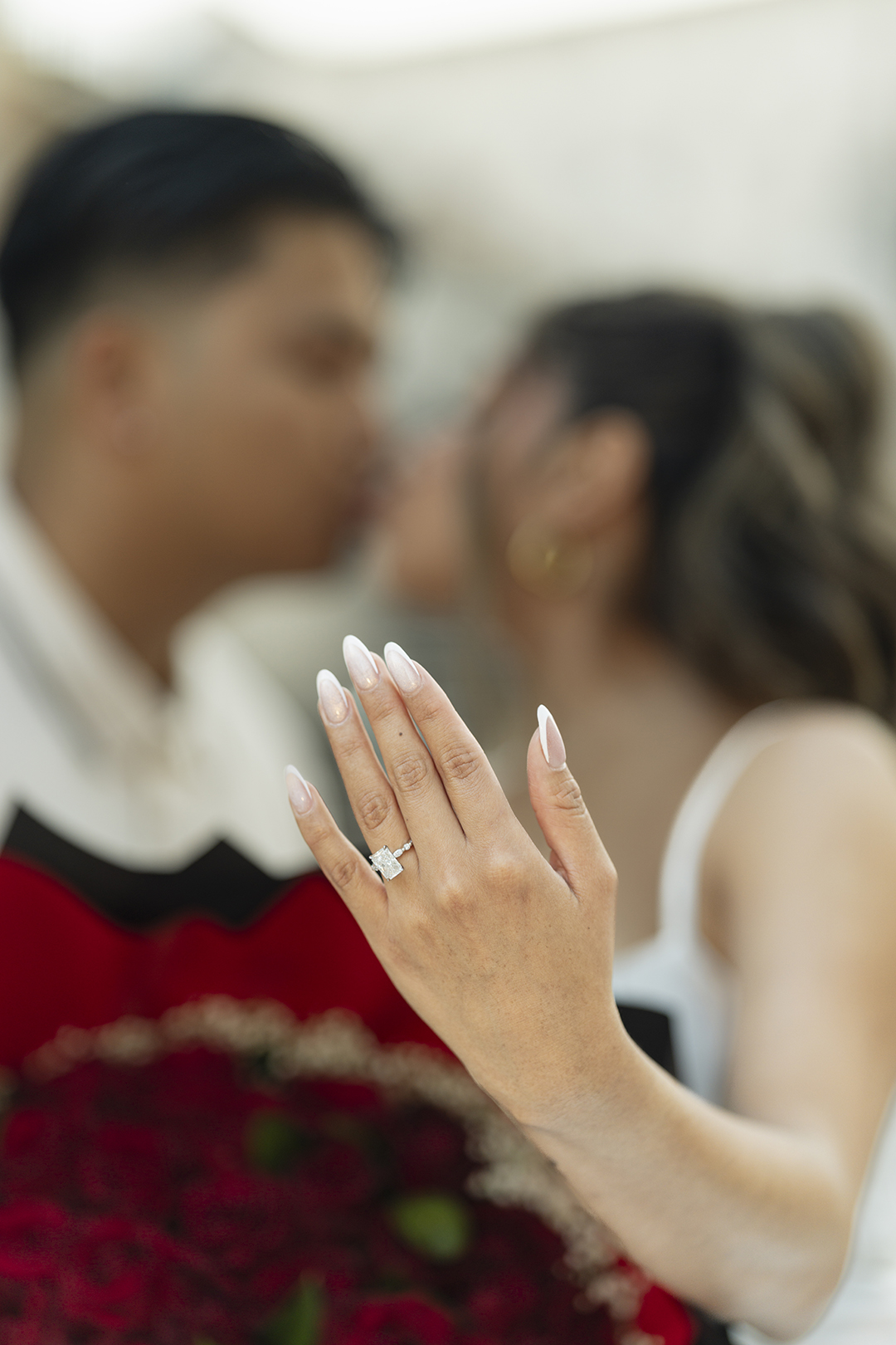 Close-up of engagement ring during surprise proposal photoshoot at Trevi Fountain in Rome