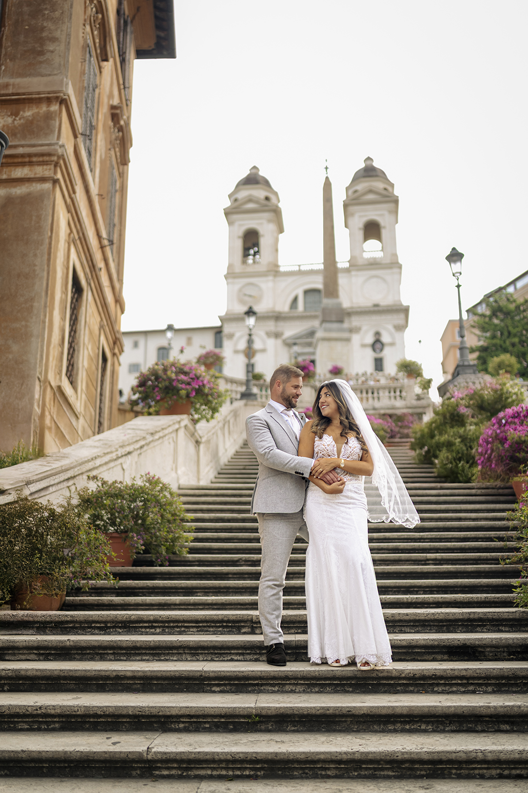 Bride and groom wedding photoshoot at the Spanish Steps Rome at sunrise, captured by Eidos Photography Rome photographer Jeff.