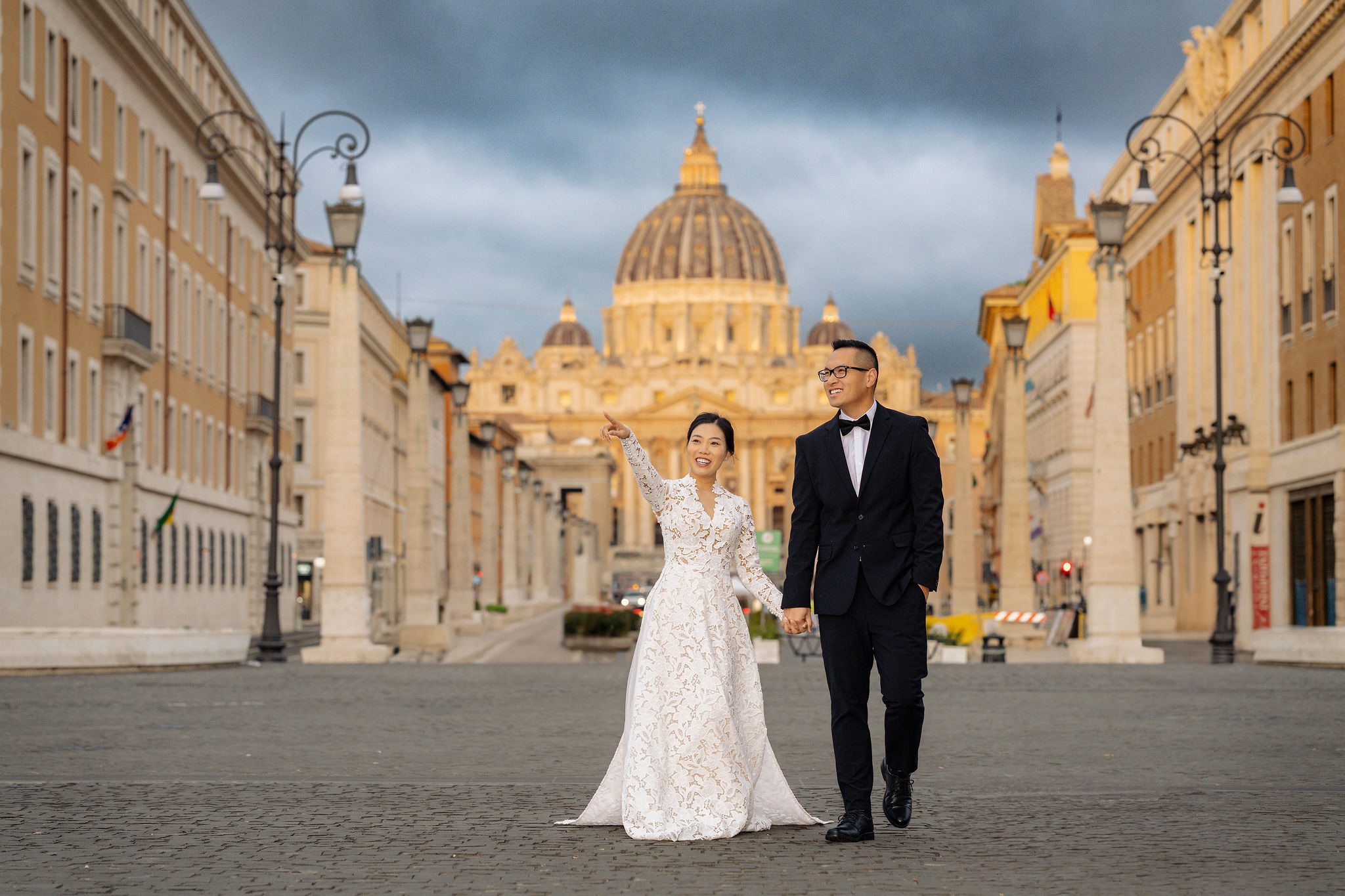 Blue hour couple portrait near St. Peter’s Basilica in Rome by Eidos Photography, Rome photographer.