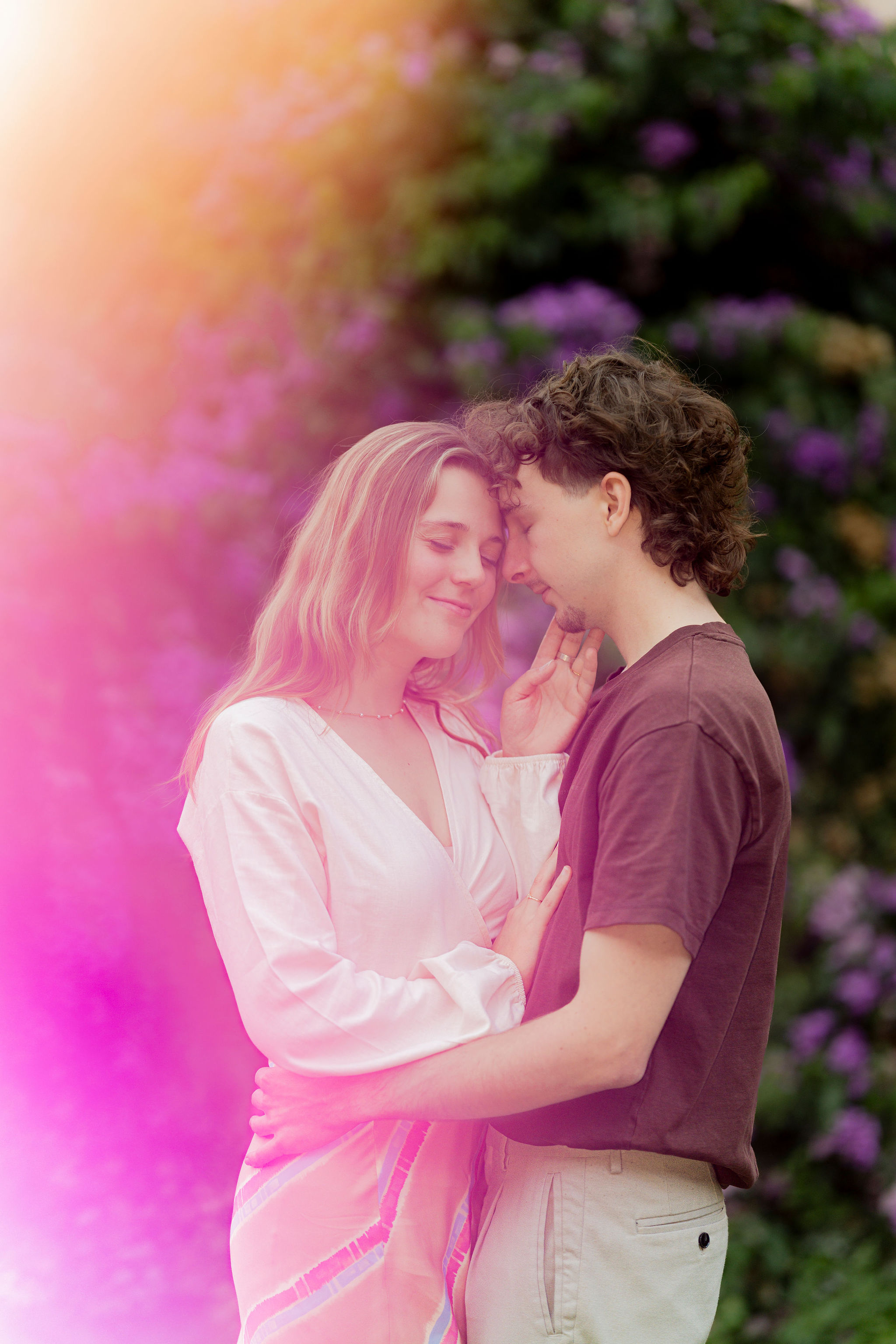 Soft romance in a hidden Aventine garden, framed by seasonal blooms and real laughter. Shot by Eidos Photography, a local Rome photographer for couple and proposal photoshoots.