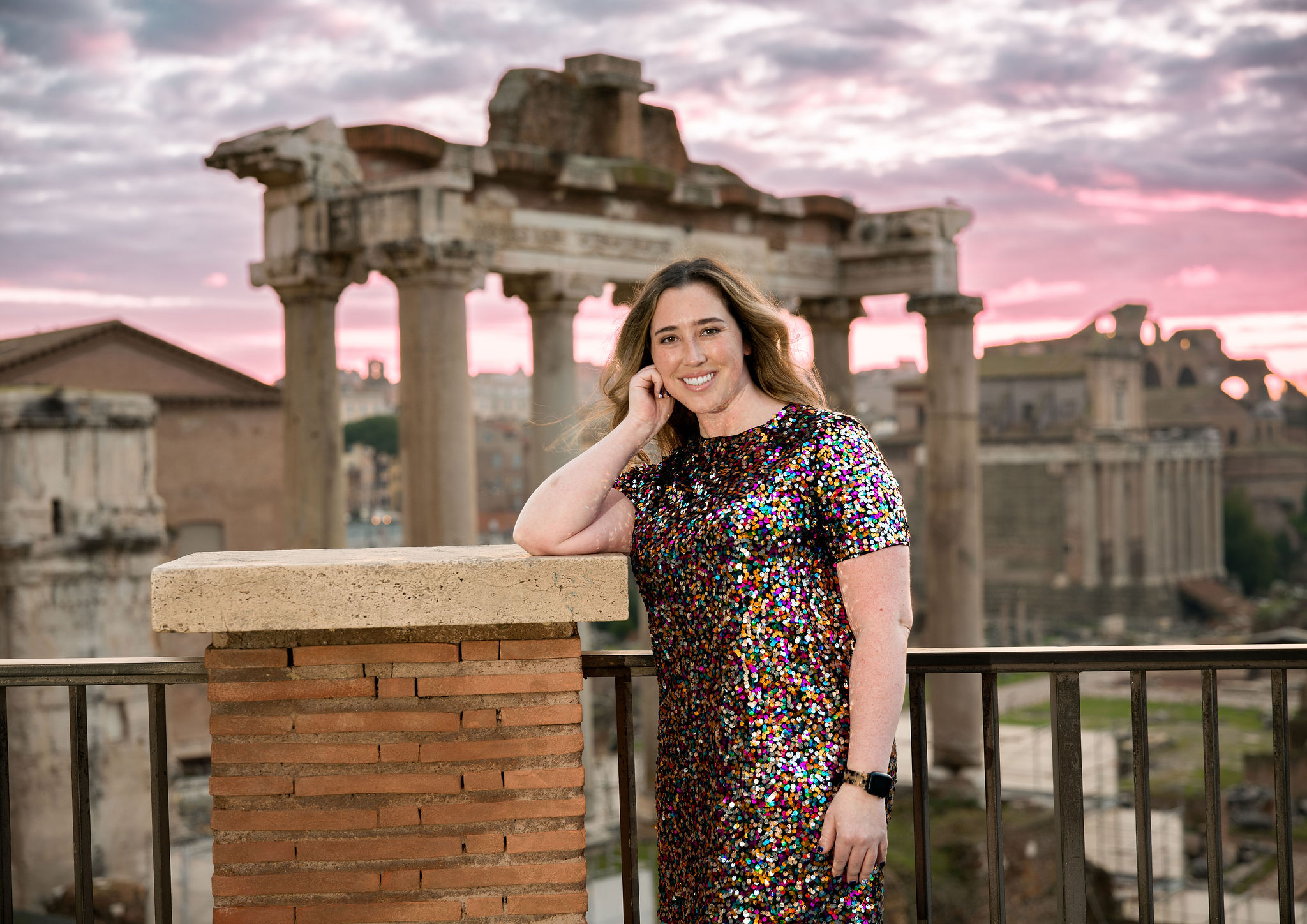 Rome photographer sample by Eidos Photography at the Roman Forum, demonstrating Hasselblad X2D II HDR with preserved detail in ruins, subject, and evening sky.