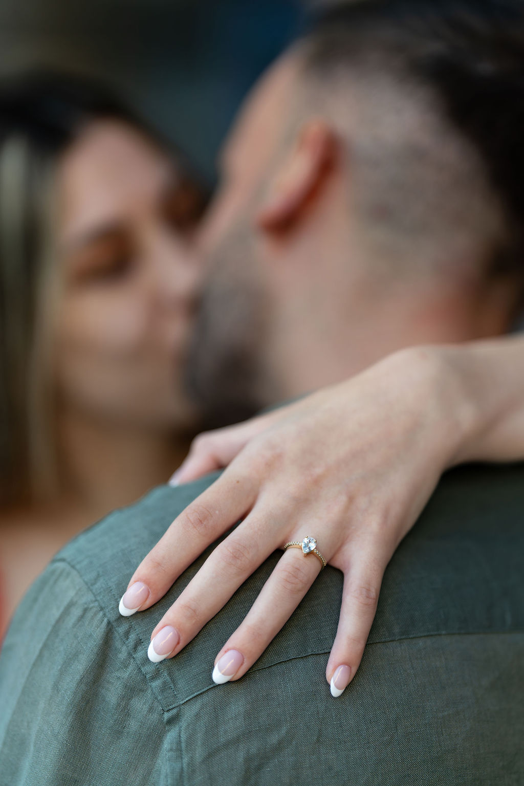 Couple walking under the Pantheon colonnade in Rome after a surprise proposal, Piazza della Rotonda, Eidos Photography, Rome photographer.