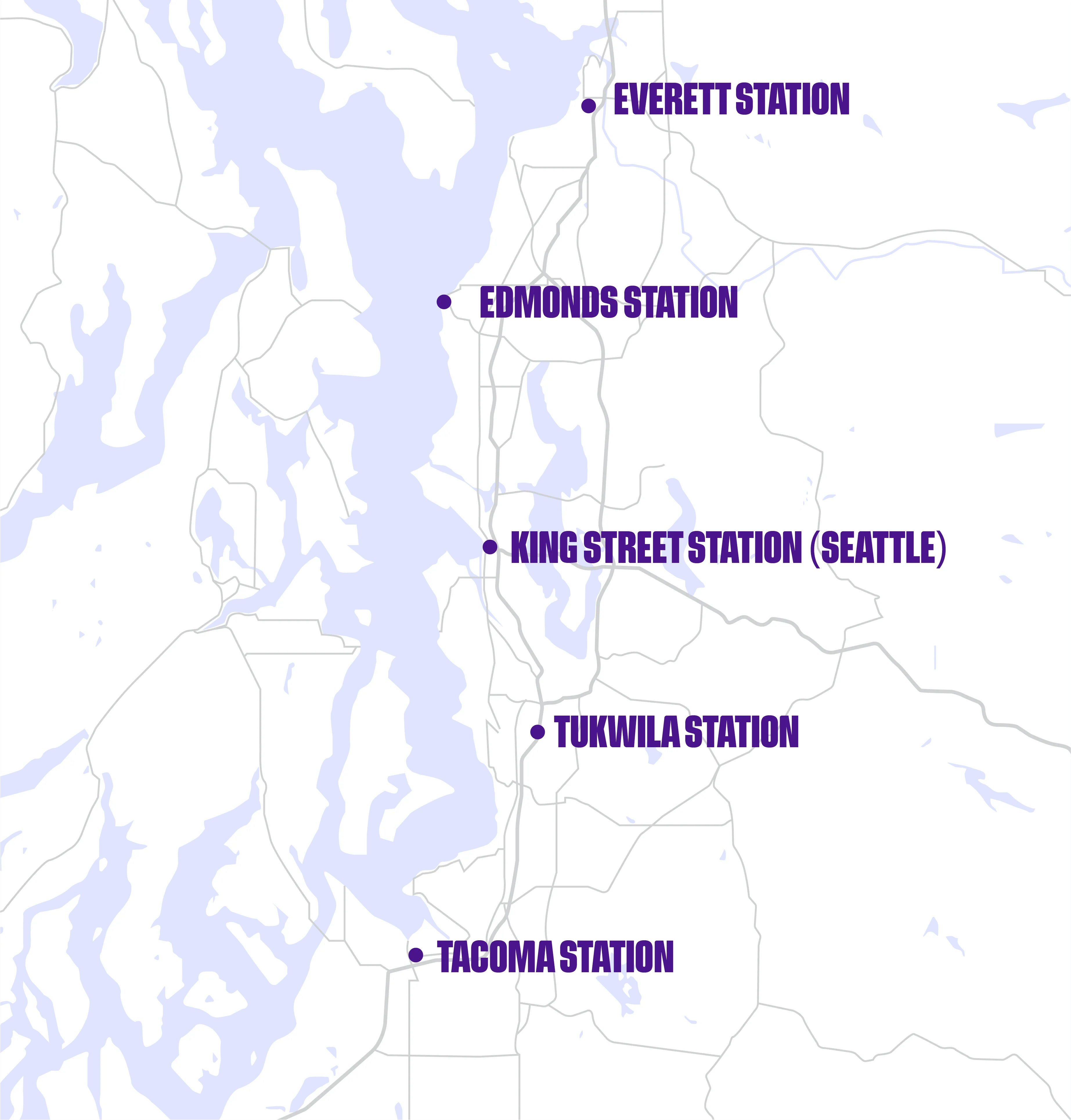 Map showing train stations in the Seattle area: Everett, Edmonds, King Street (Seattle), Tukwila, and Tacoma stations along a rail line by water bodies.