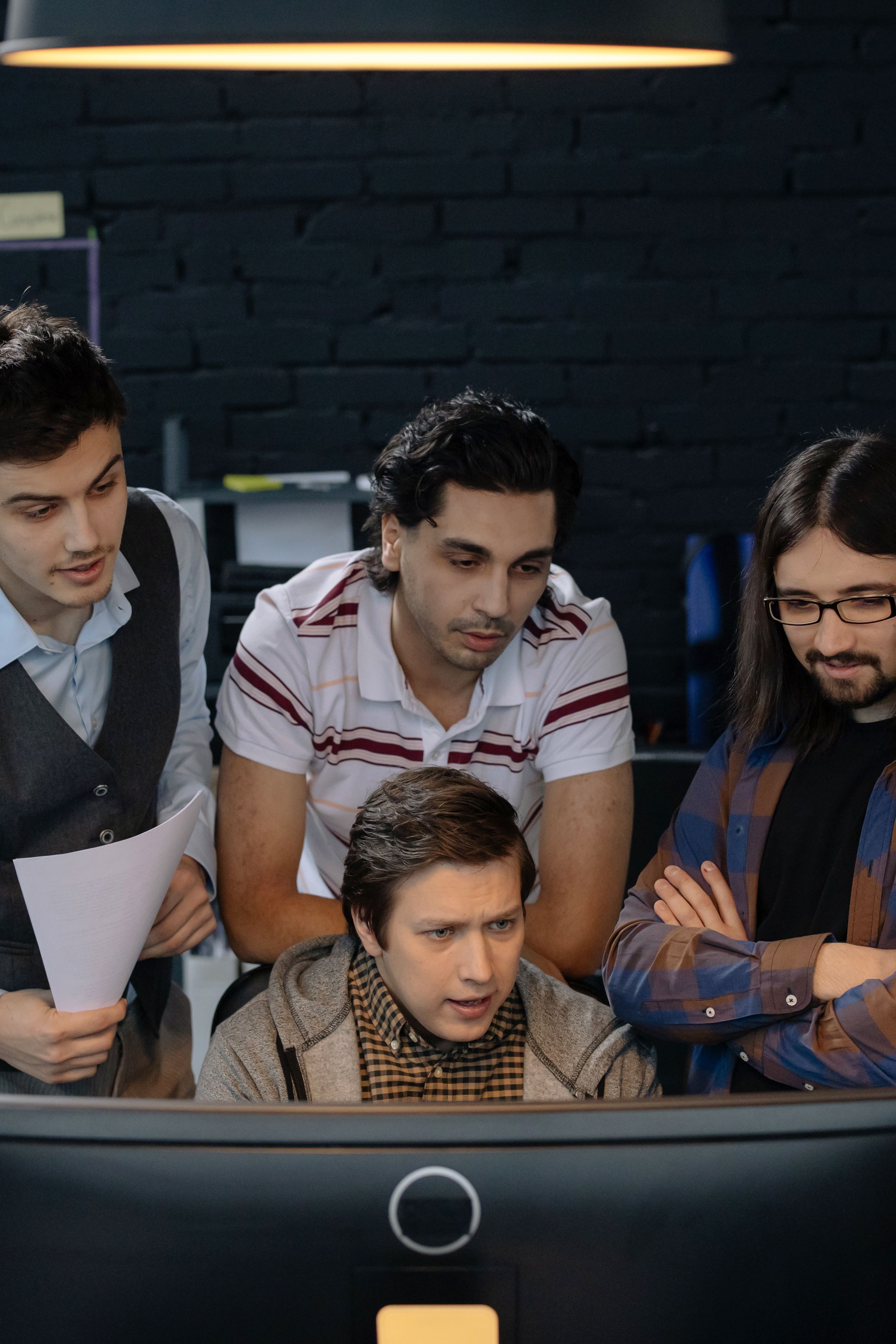 Engineering team collaborating in a startup office
