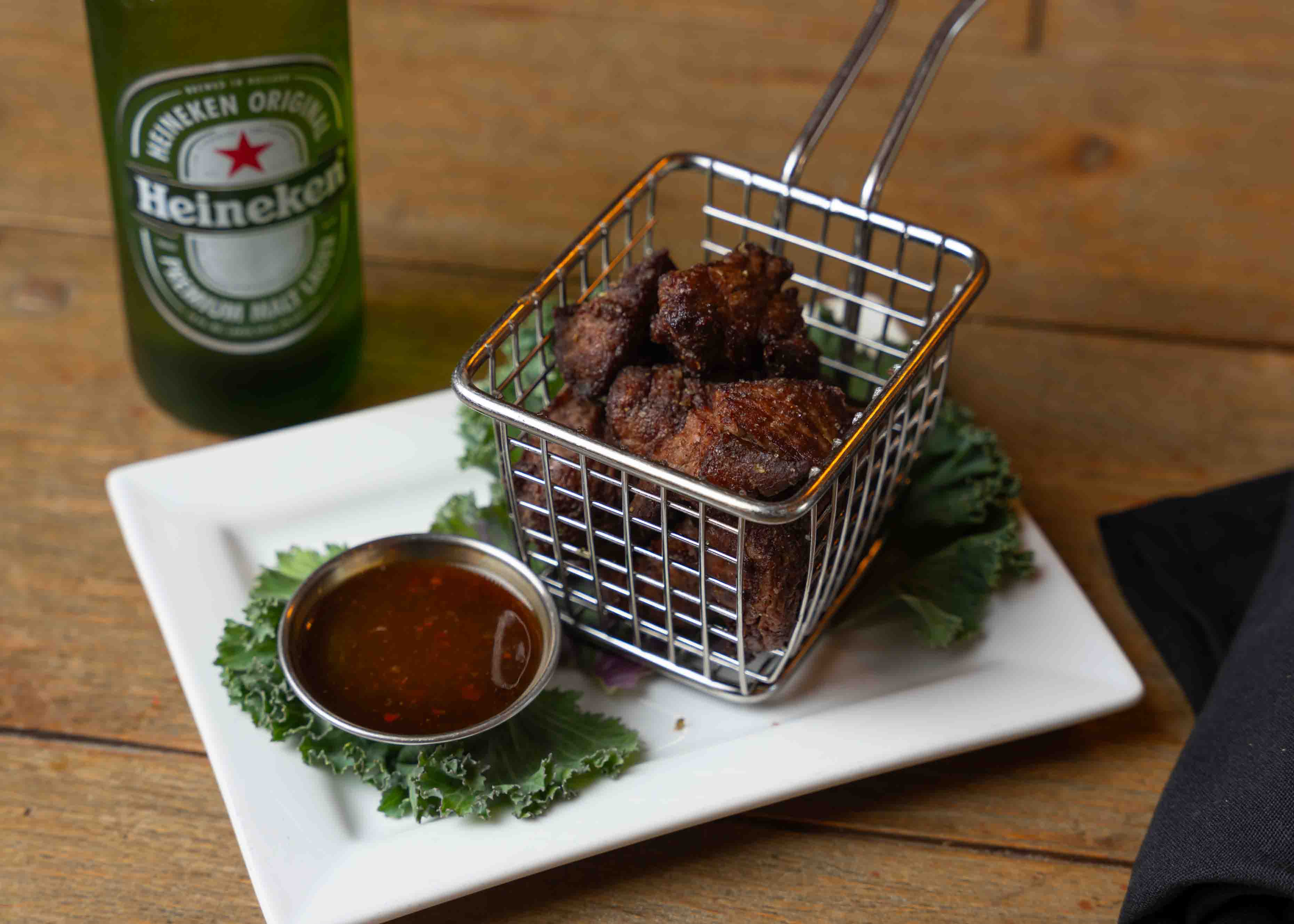Double Butter Chislic, seared prime steak tips with garlic butter, a Sioux Falls classic at Crawford's.