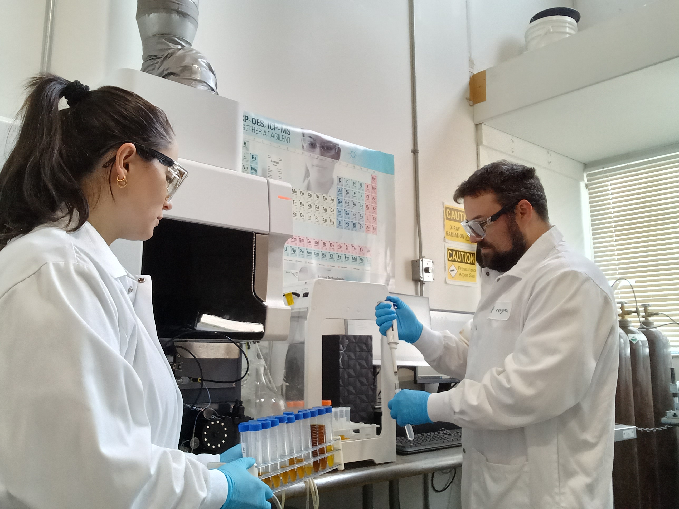 Members of the Regenx technical team at work in the company's mineral processing laboratory.