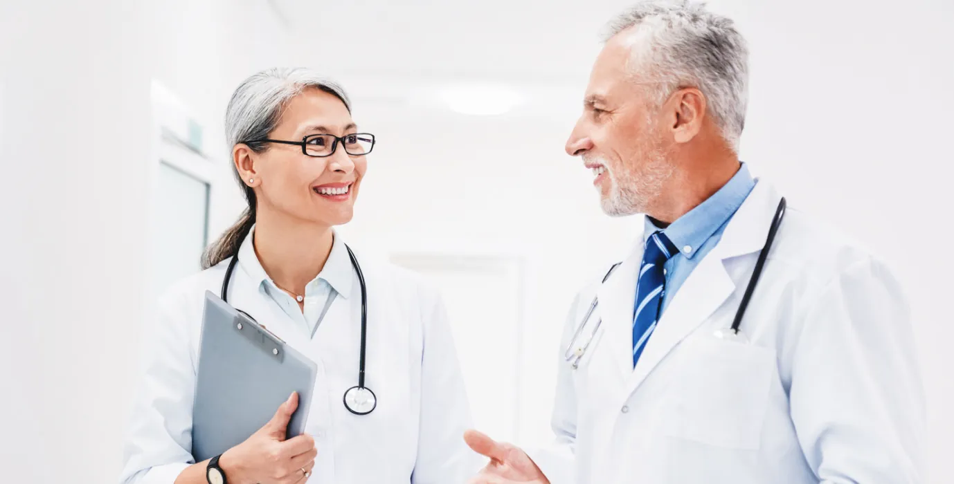Neurologists discussing their practice