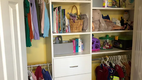 A child's closet organized with tips from Closets by Design.