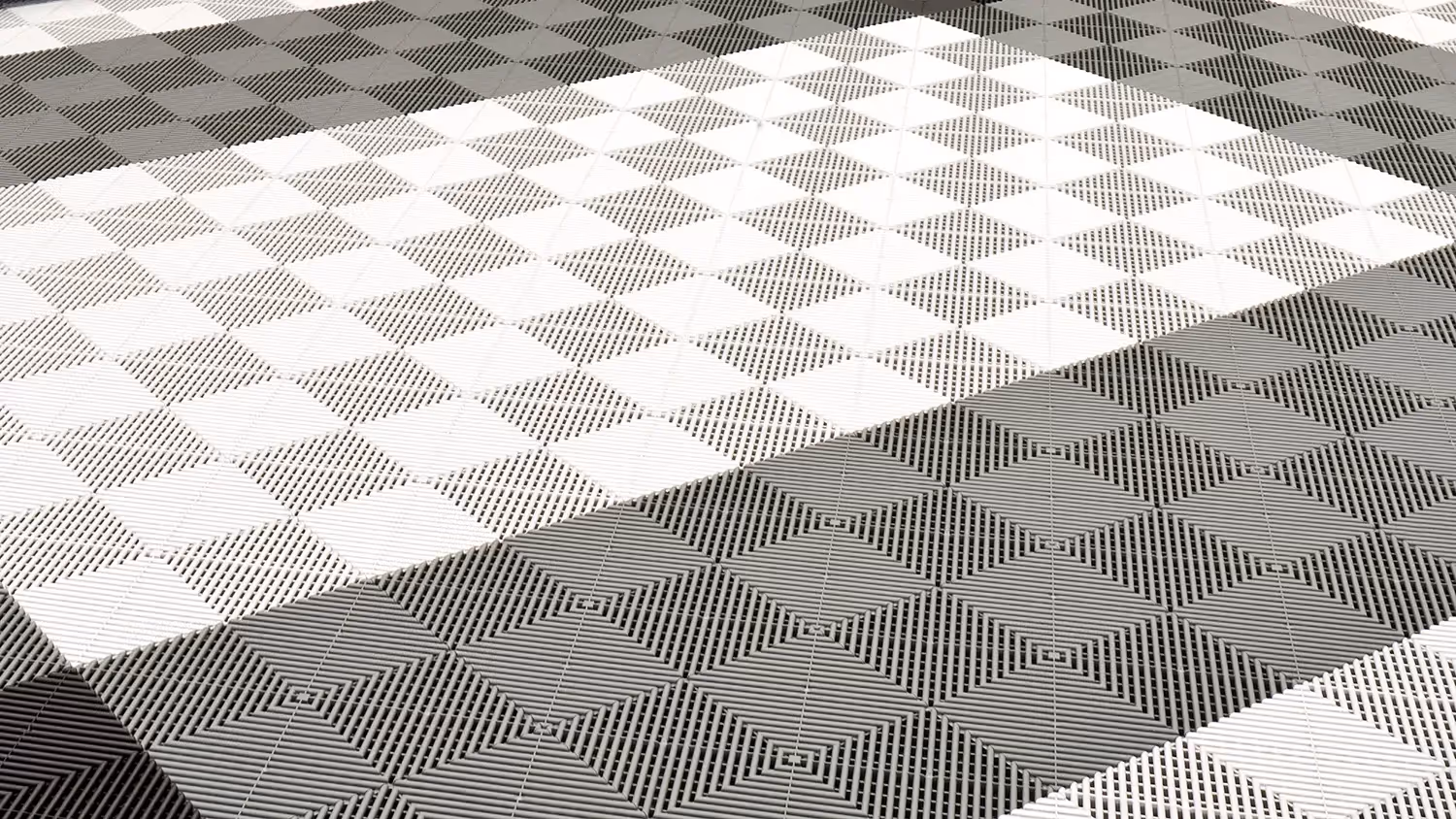 Modular tile design allows easy installation and adjustments for changing garage needs.