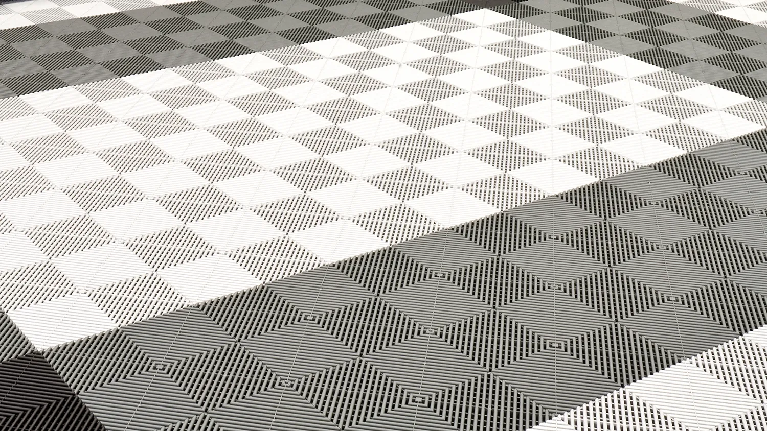 Modular tile design allows easy installation and adjustments for changing garage needs.