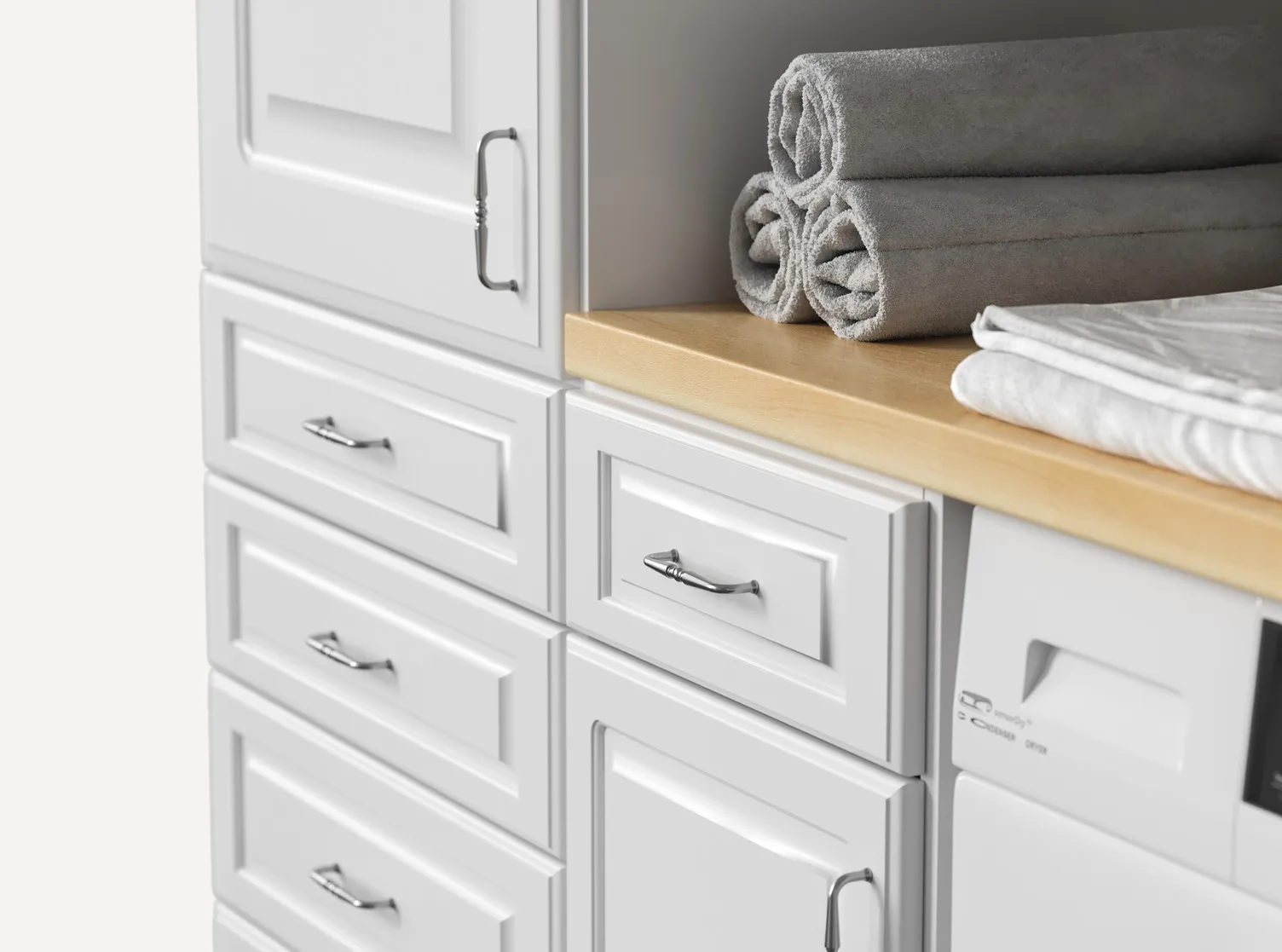 closets by design laundry door and drawers
