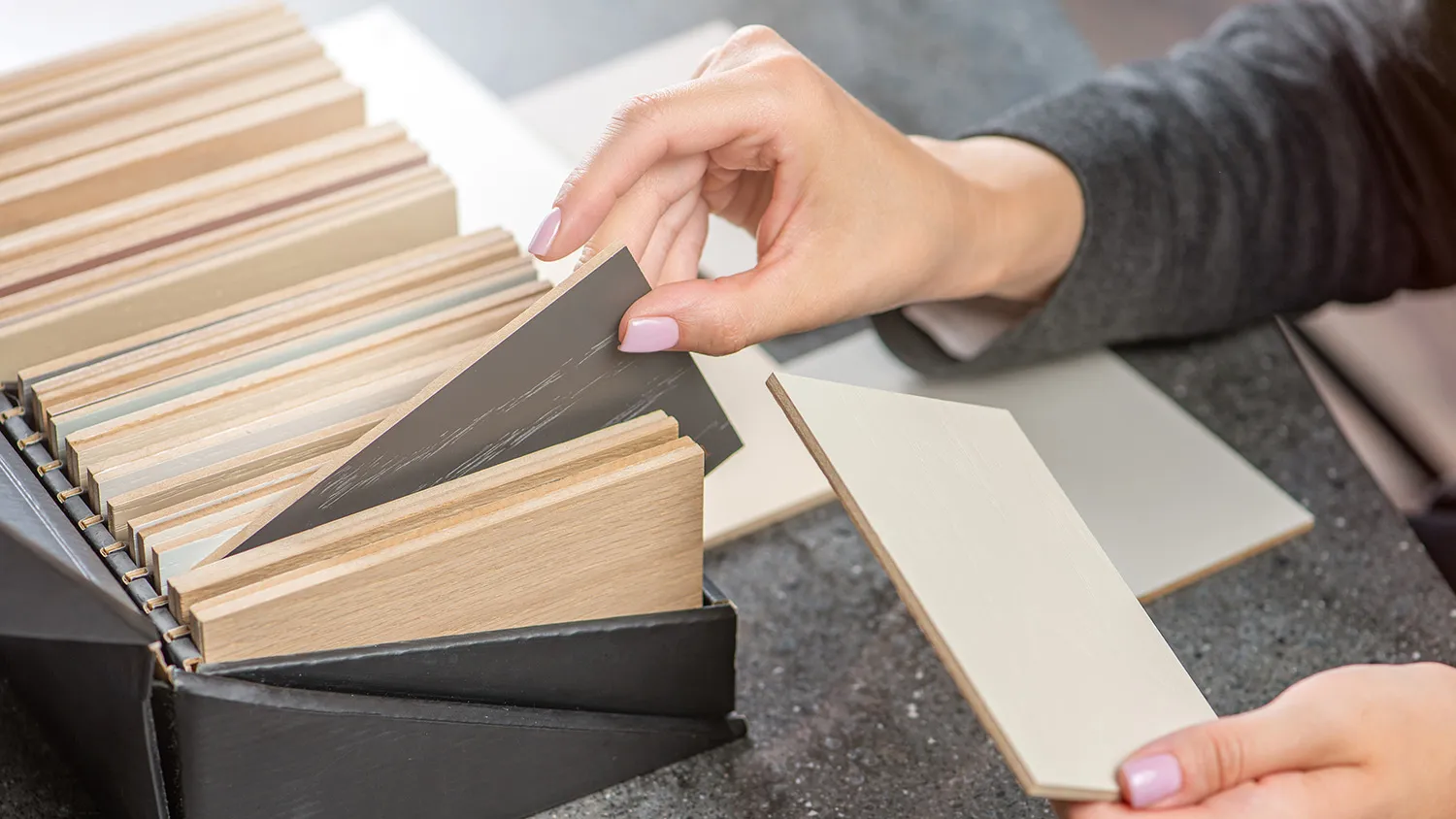 hand picking out wood