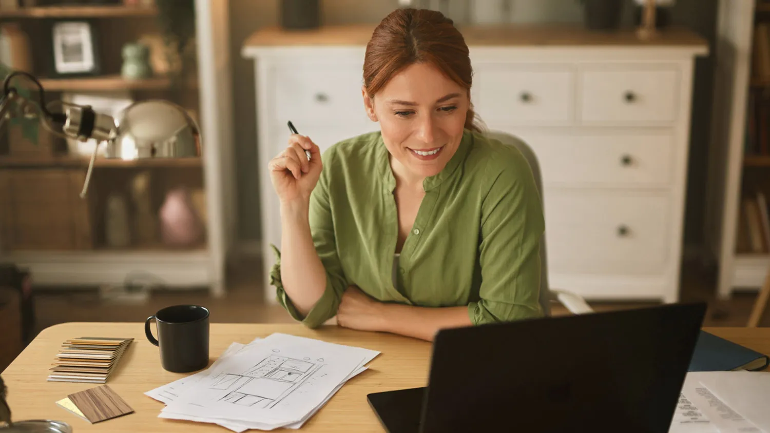 woman designing on computer