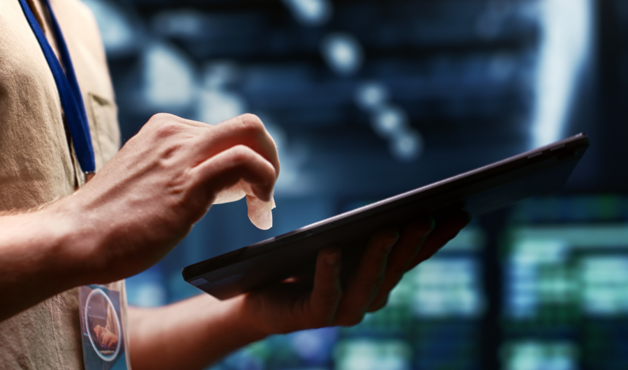 A close-up view of a car dashboard featuring a modern digital display with indicators and controls.