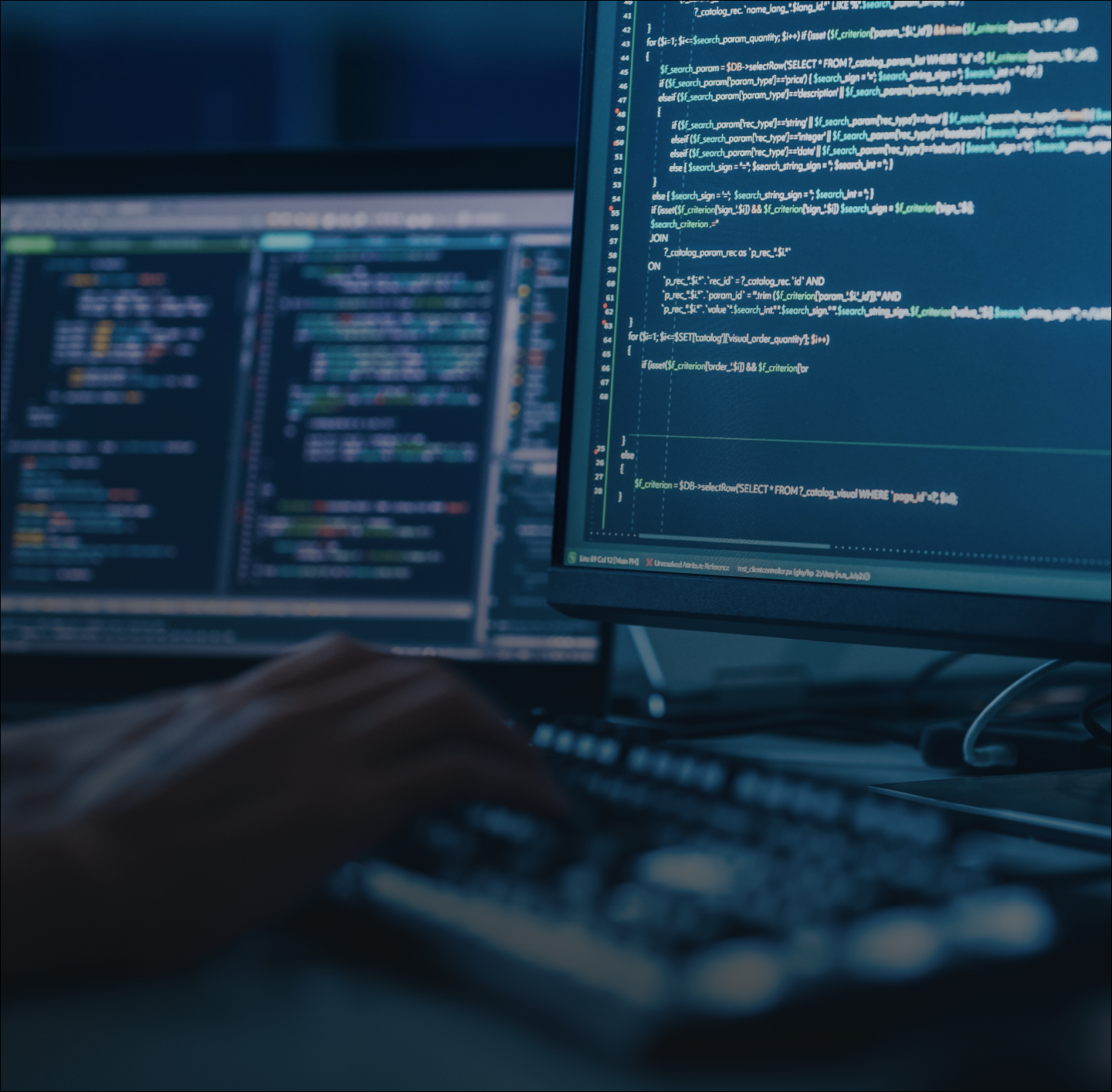 A man and woman sitting together on a couch, watching television.