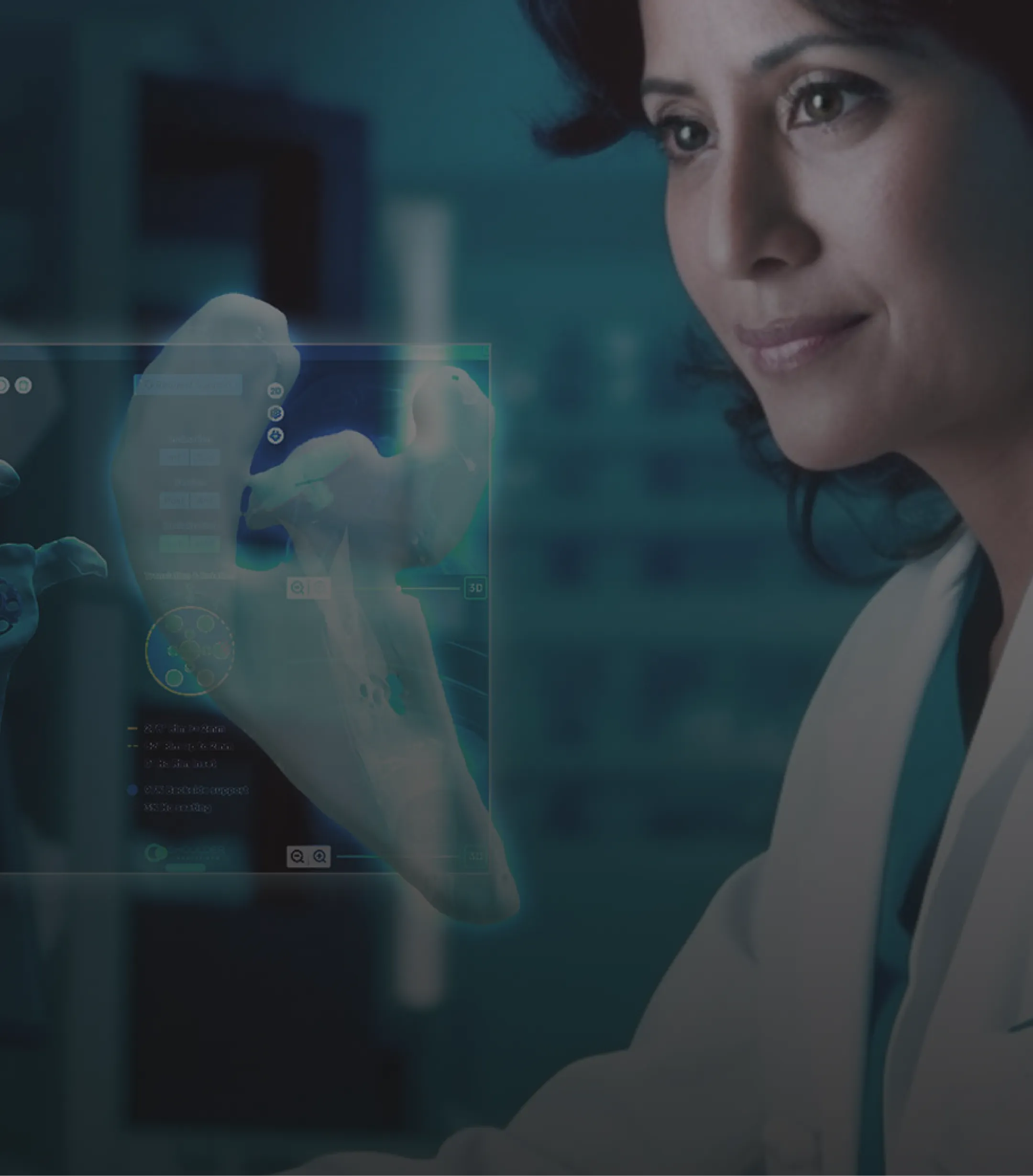 A woman in a lab coat analyzes information displayed on a screen in a research laboratory.
