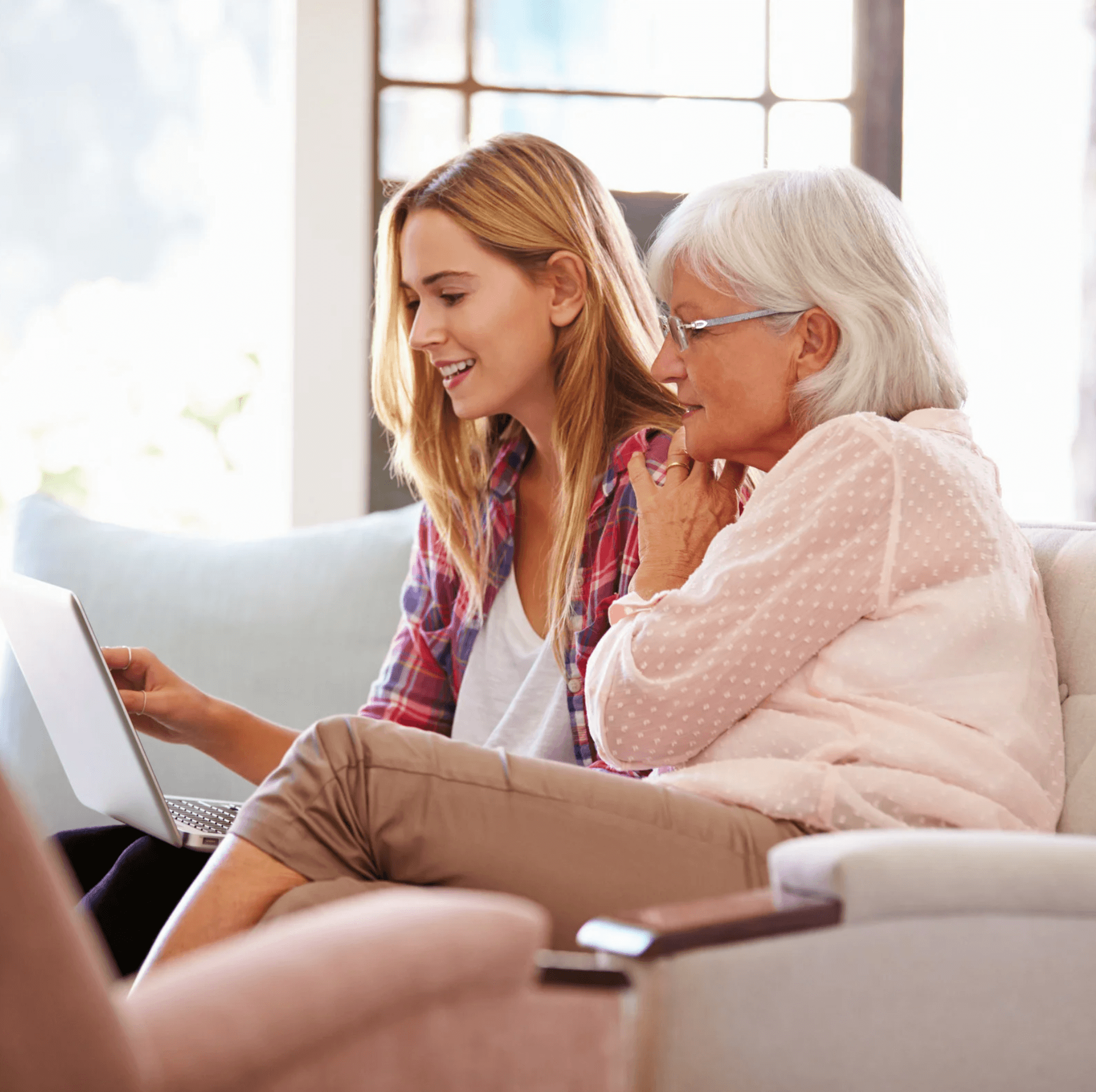 young woman helping a senior with depression