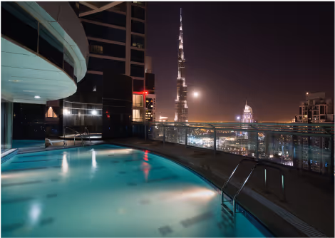 Swimming Pool Overlooking Burj Khalifa at Night