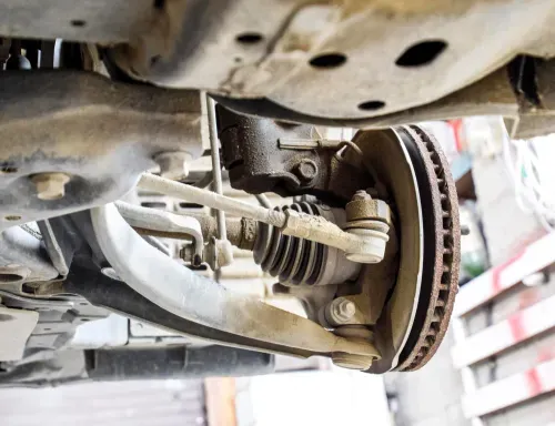 Suspension and steering components inspected during auto repair service in Edmonton