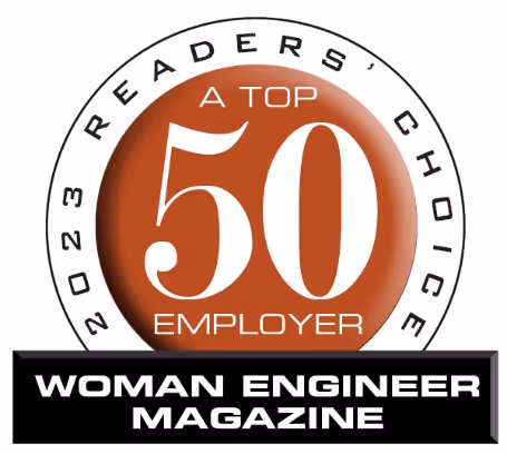 A circular logo featuring the text '2023 Readers' Choice A Top 50 Employer' over a brown circle and 'Woman Engineer Magazine' in white text on a black rectangular background.