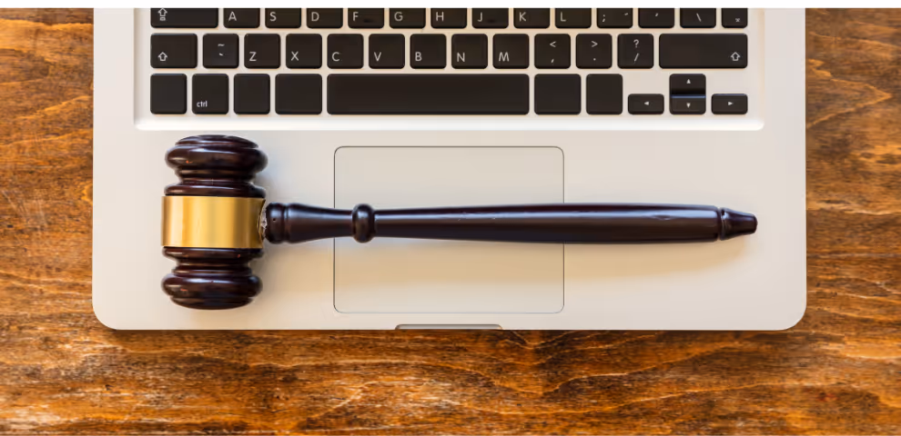 Gavel on top of a laptop