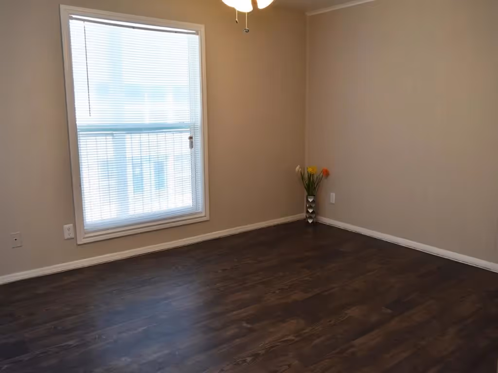 Empty room with wood floors