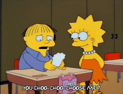 GIF of Ralph Wiggum reading a Valentine from Lisa Simpson saying "You choo, choo, choose me?"