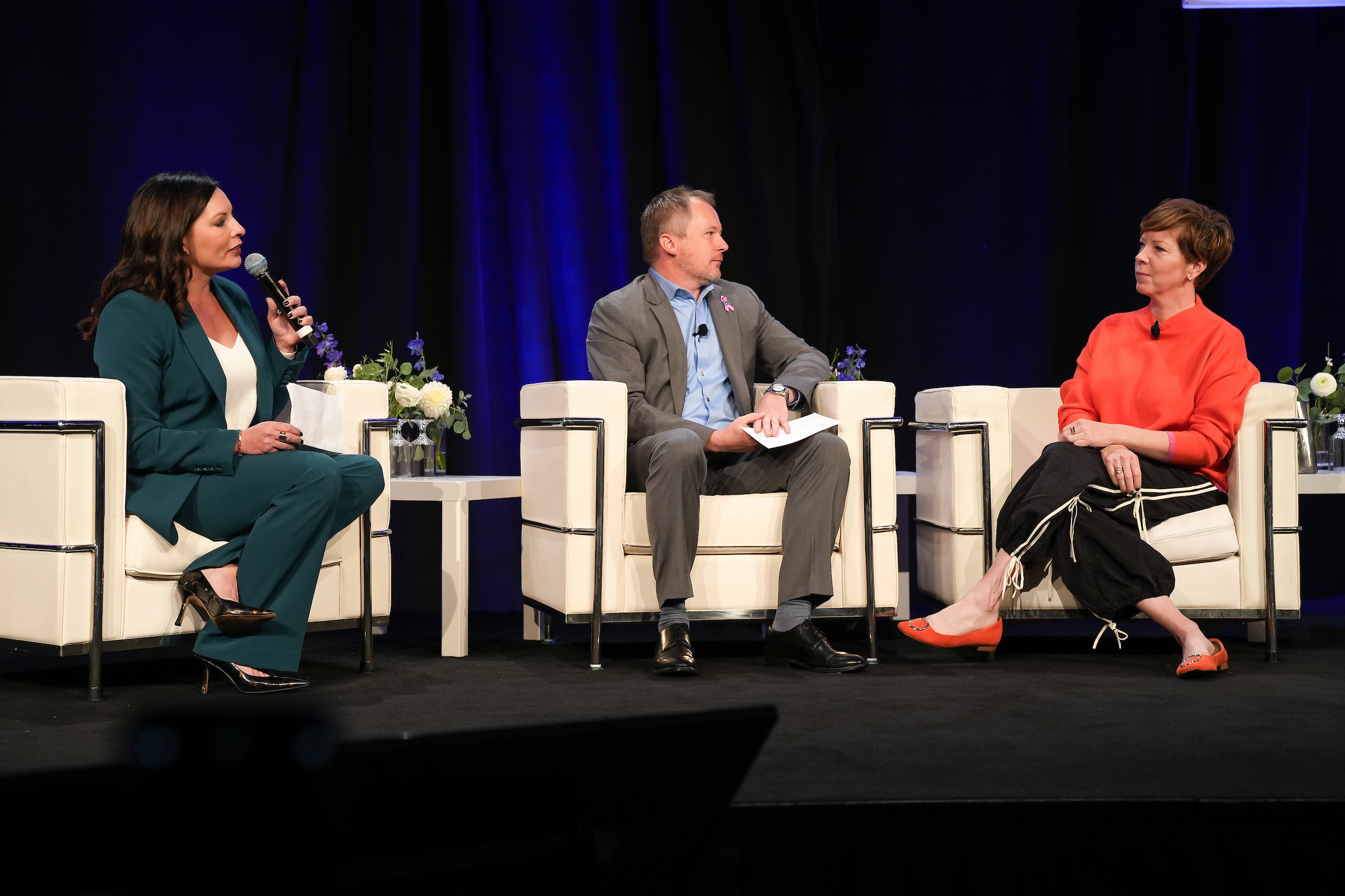 Seattle Sports Commission Women in Leadership Breakfast panelists chatting on stage