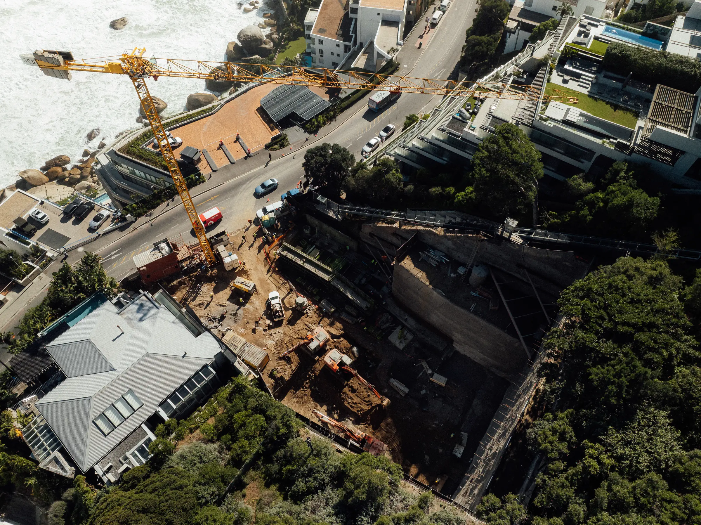 Looking down on the 23 Victoria Road site between Victoria Road and the Atlantic, with the tower crane in position
