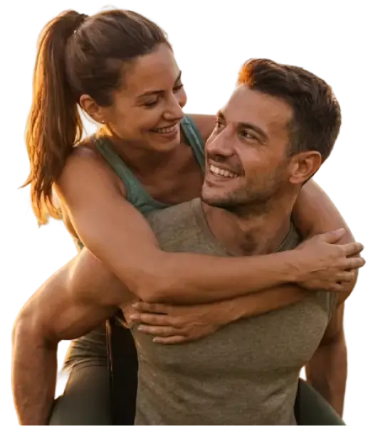 a man carrying a woman